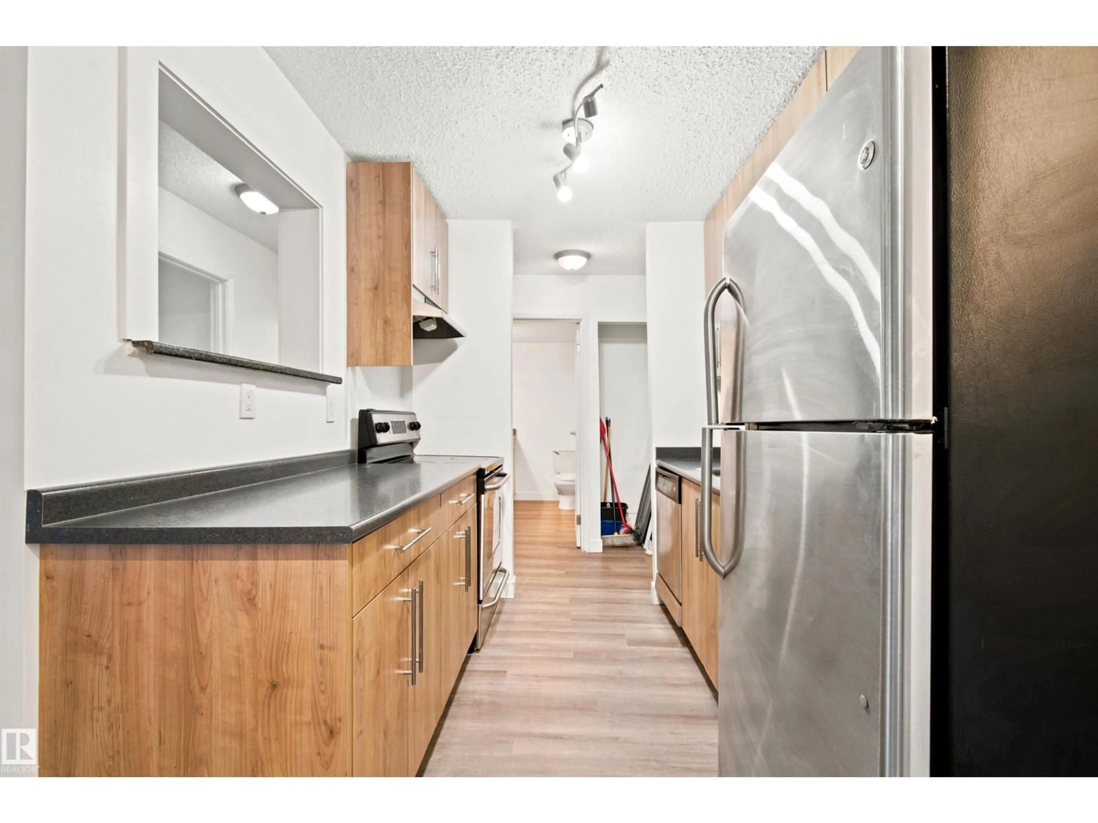 Standard kitchen, wood/laminate floor for #112 - 10529 93 ST, Edmonton Alberta T5H1X6