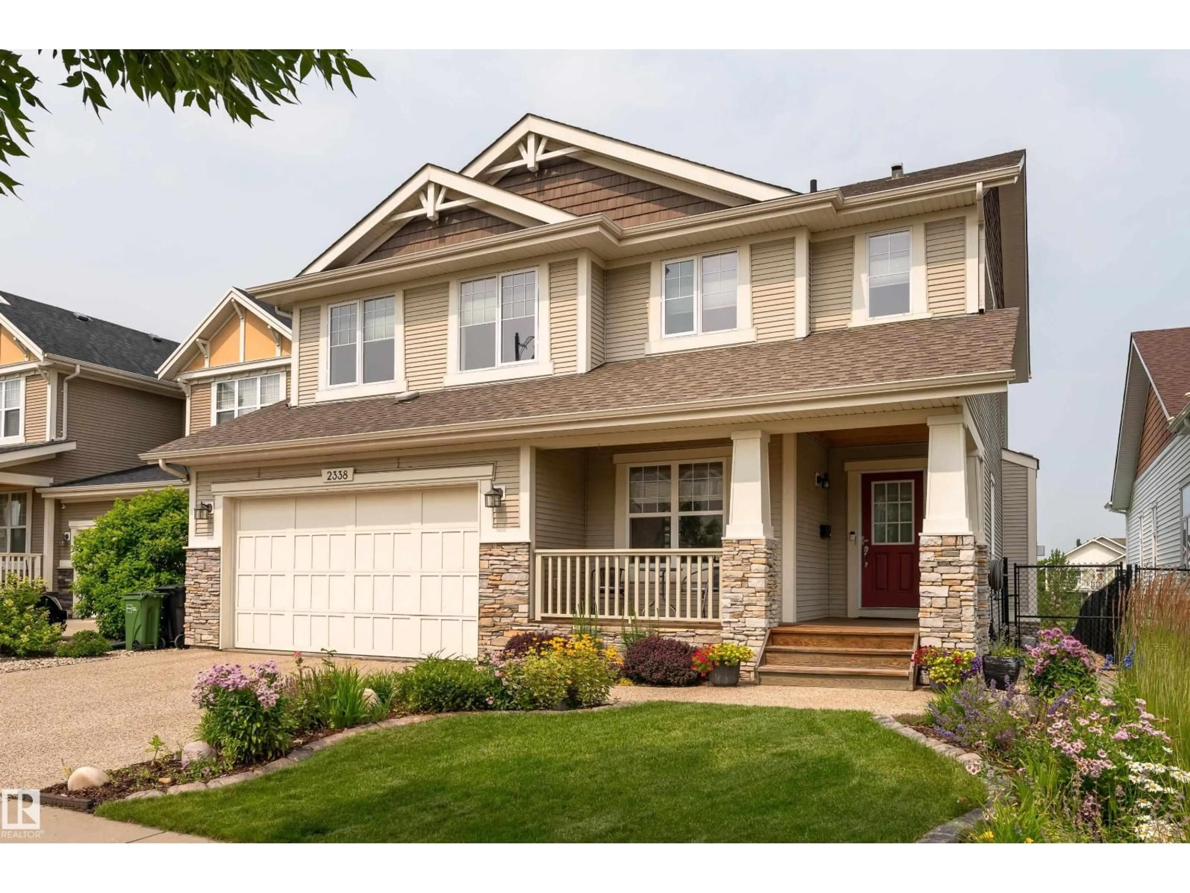 Home with vinyl exterior material, street for 2338 FREZENBERG AV, Edmonton Alberta T5E5R9