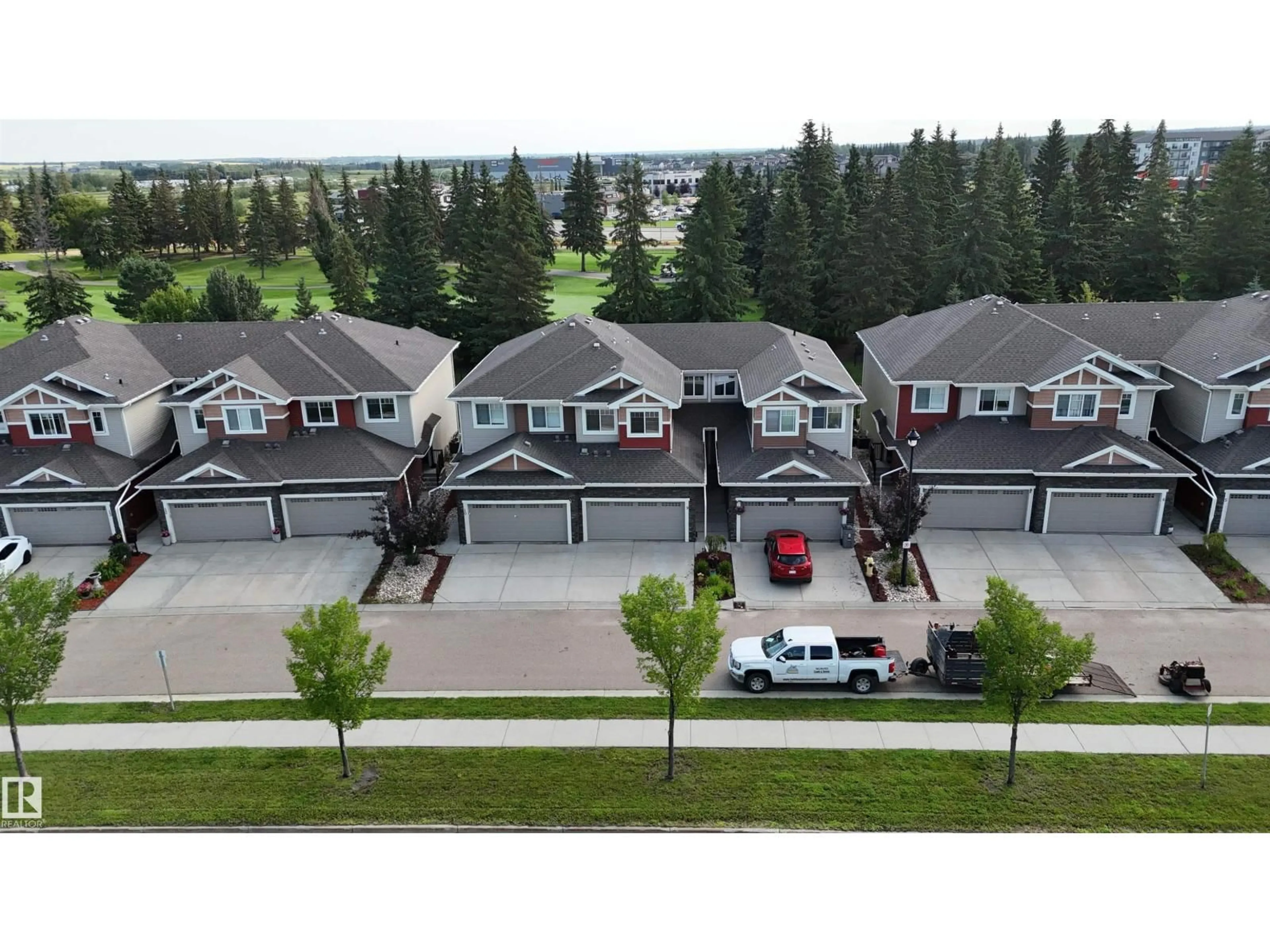 A pic from outside/outdoor area/front of a property/back of a property/a pic from drone, unknown for 9 - 94 LONGVIEW DR, Spruce Grove Alberta T7X0W3