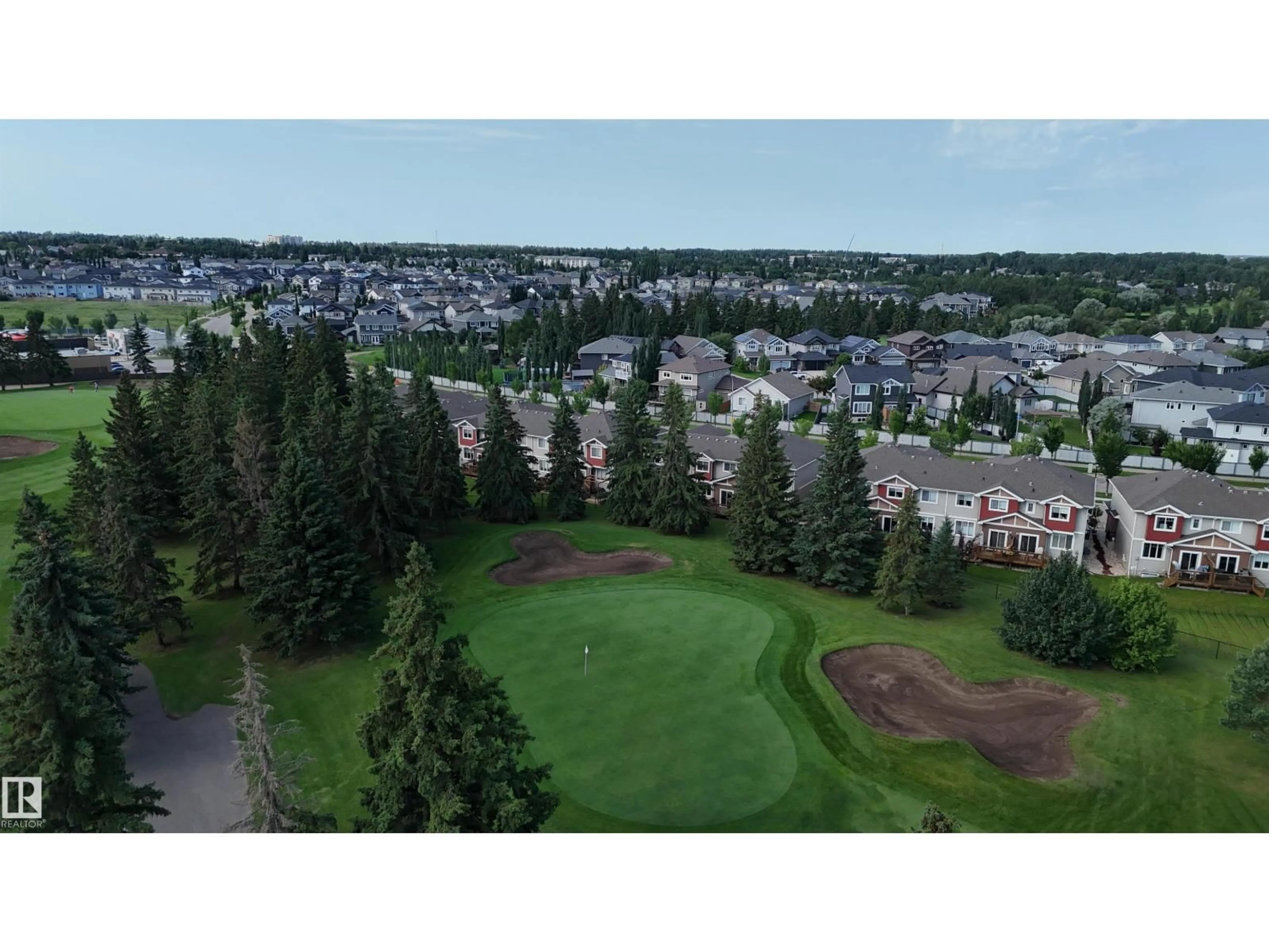 A pic from outside/outdoor area/front of a property/back of a property/a pic from drone, mountain view for 9 - 94 LONGVIEW DR, Spruce Grove Alberta T7X0W3