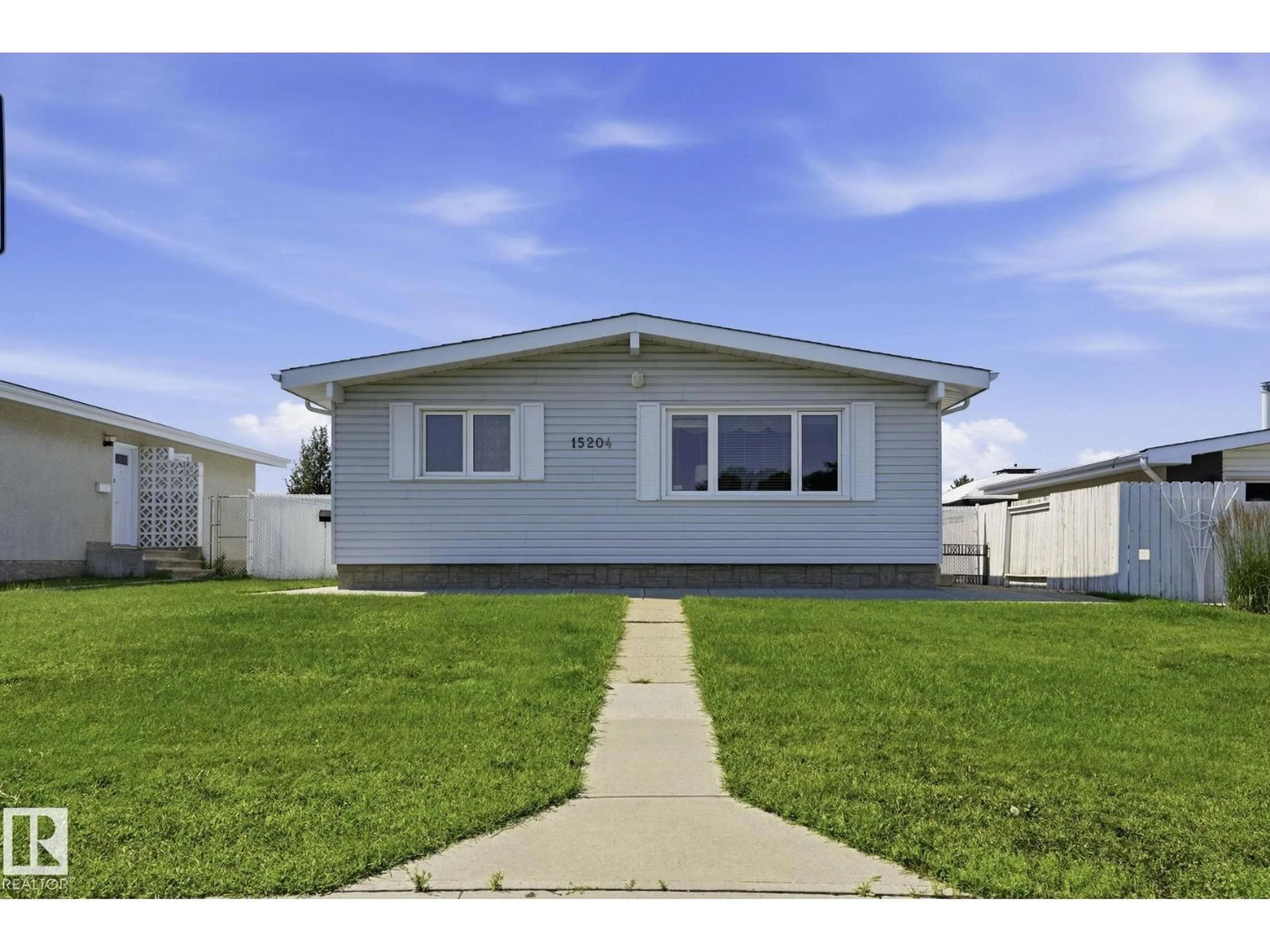 Home with vinyl exterior material, street for NW - 15204 75A ST, Edmonton Alberta T5C1A7