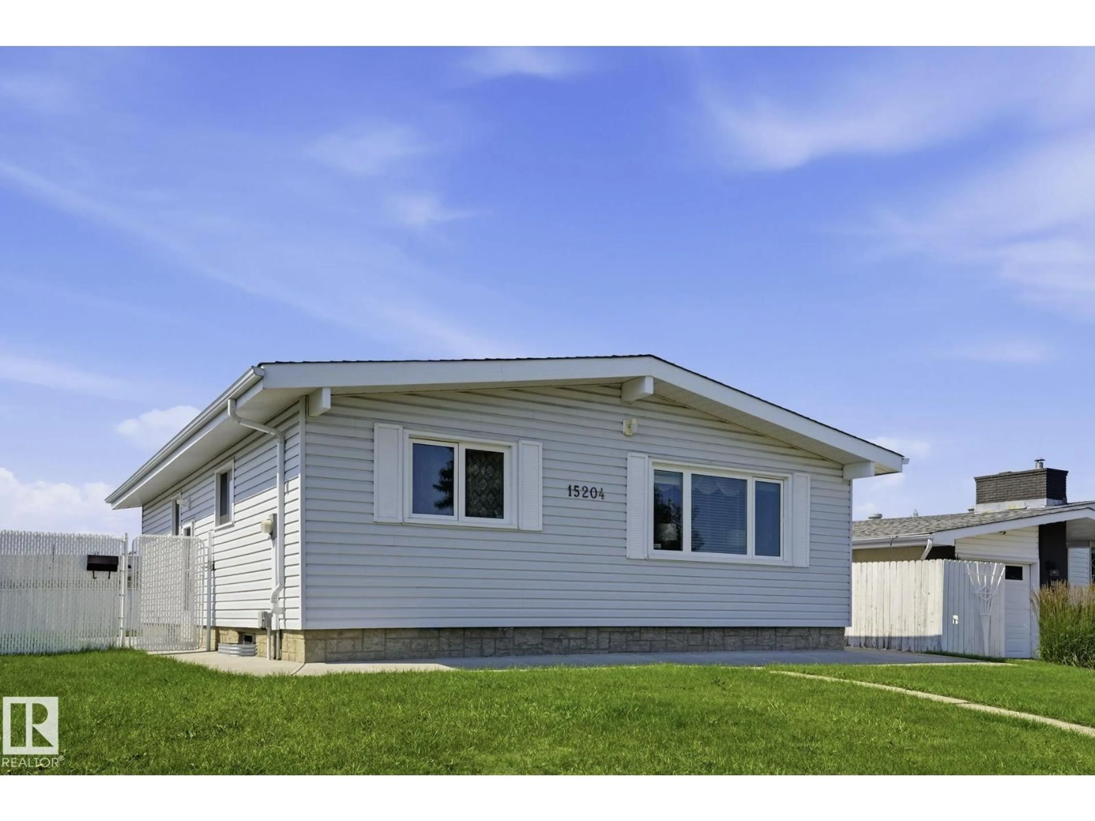 Home with vinyl exterior material, building for NW - 15204 75A ST, Edmonton Alberta T5C1A7