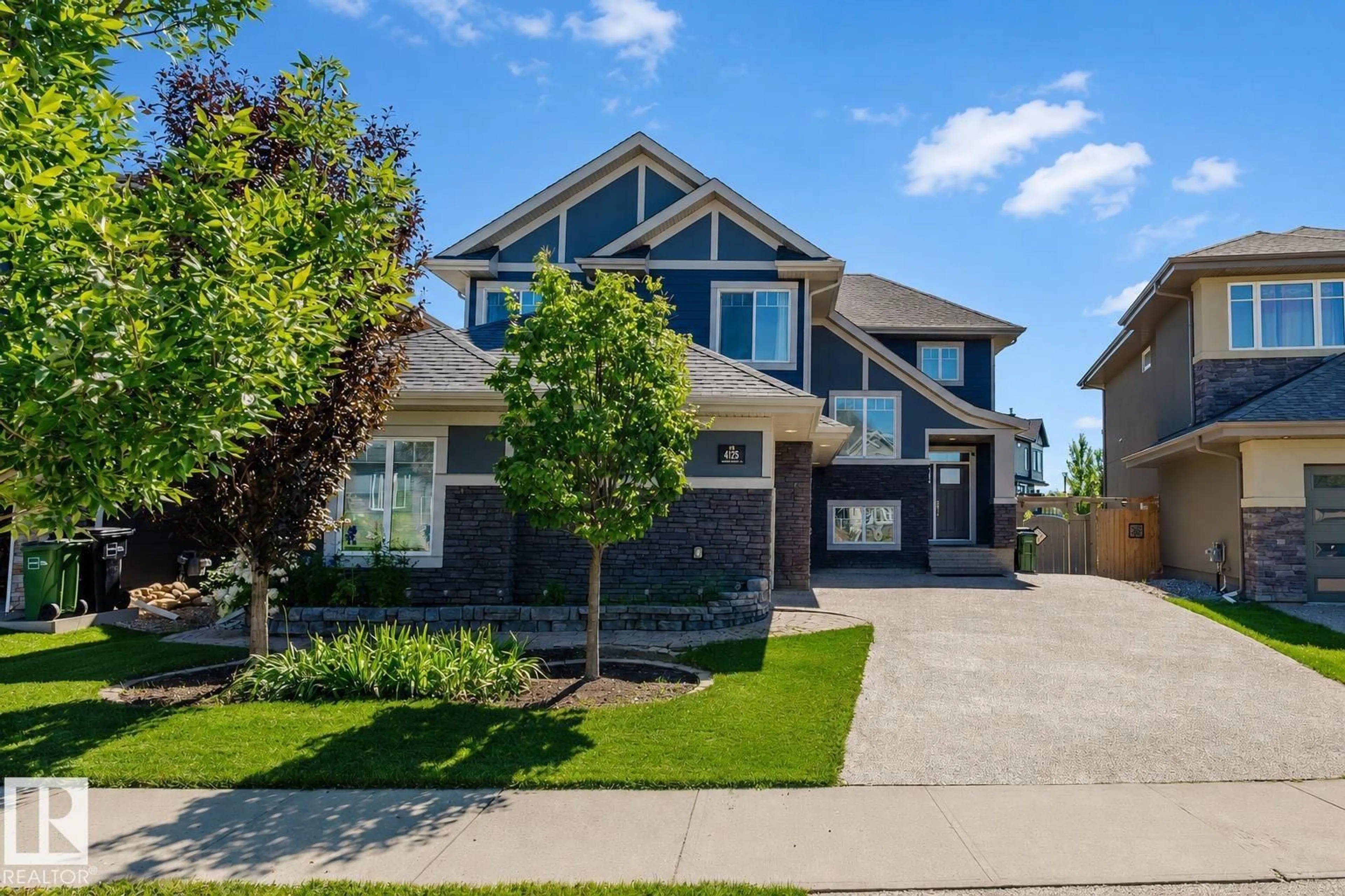 Home with brick exterior material, street for 4125 KENNEDY GREEN, Edmonton Alberta T6W3B1