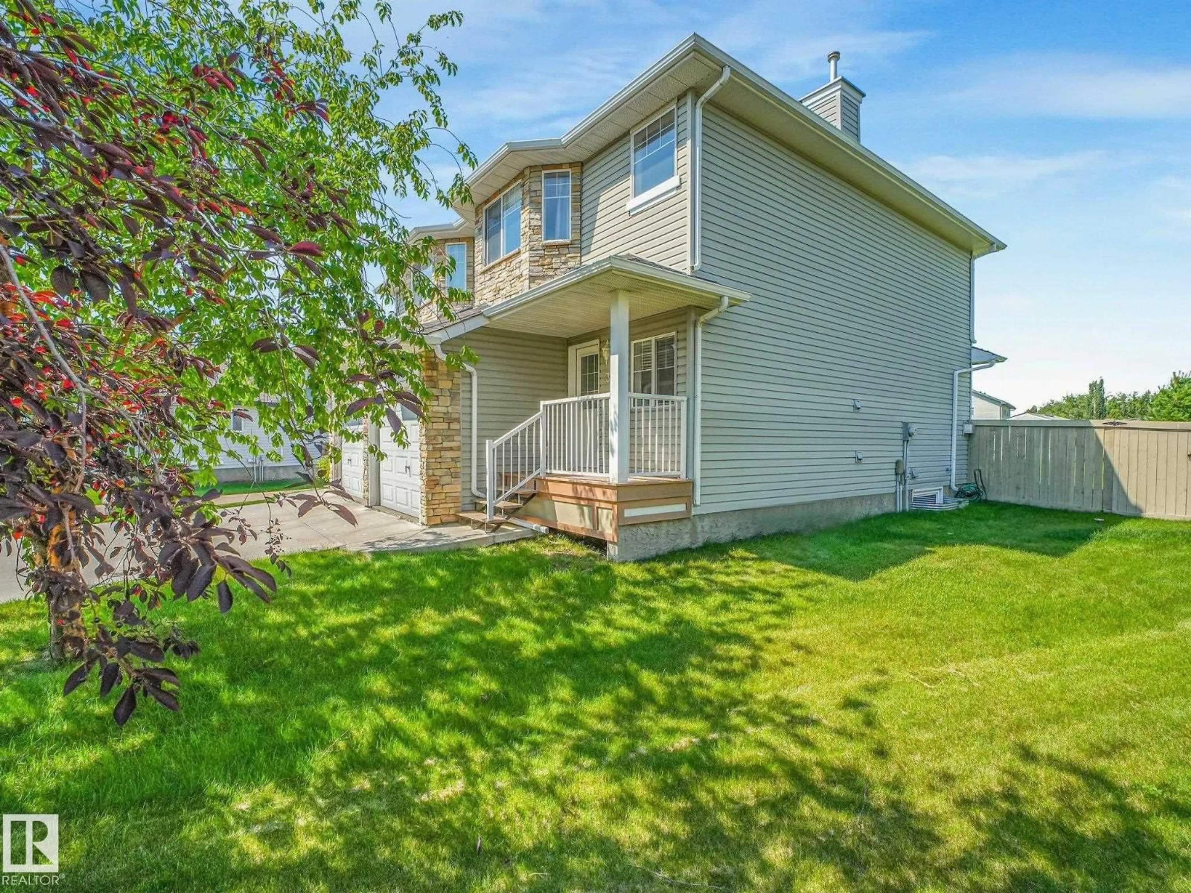 Home with vinyl exterior material, street for NW - 3635 11 ST, Edmonton Alberta T6T0E9
