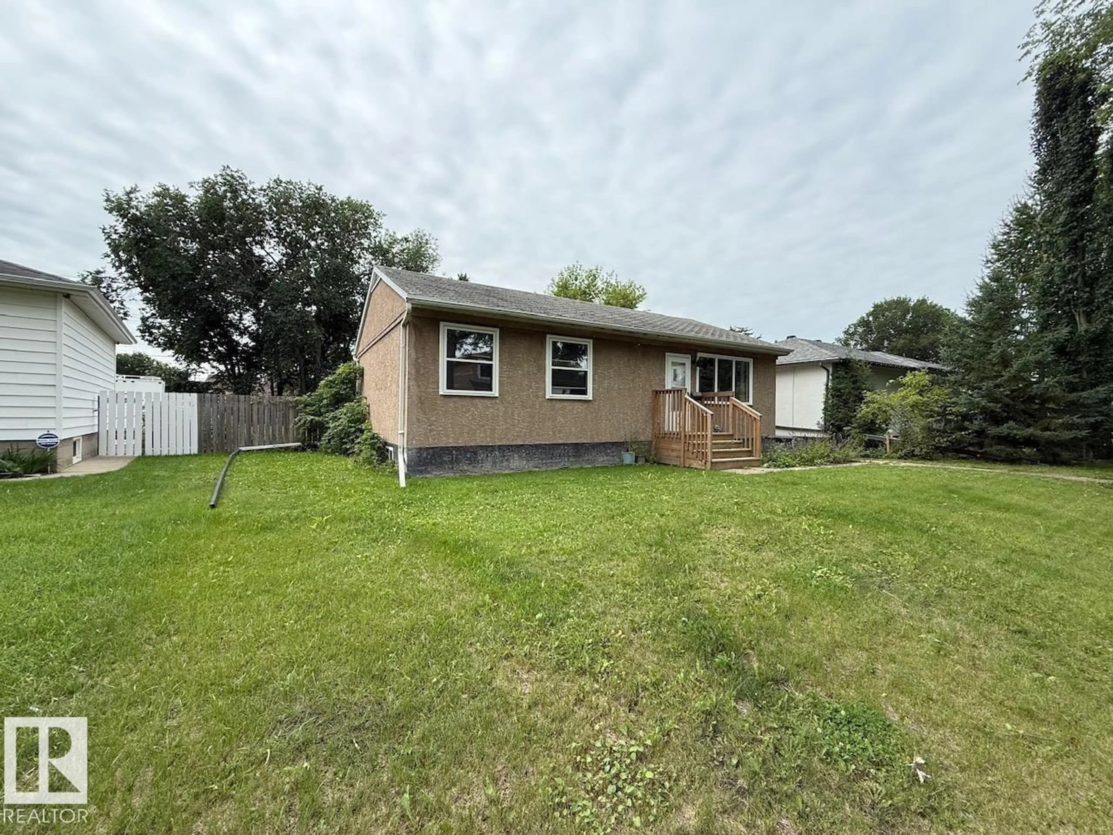 A pic from outside/outdoor area/front of a property/back of a property/a pic from drone, street for 7607 83 AV, Edmonton Alberta T6C1A2