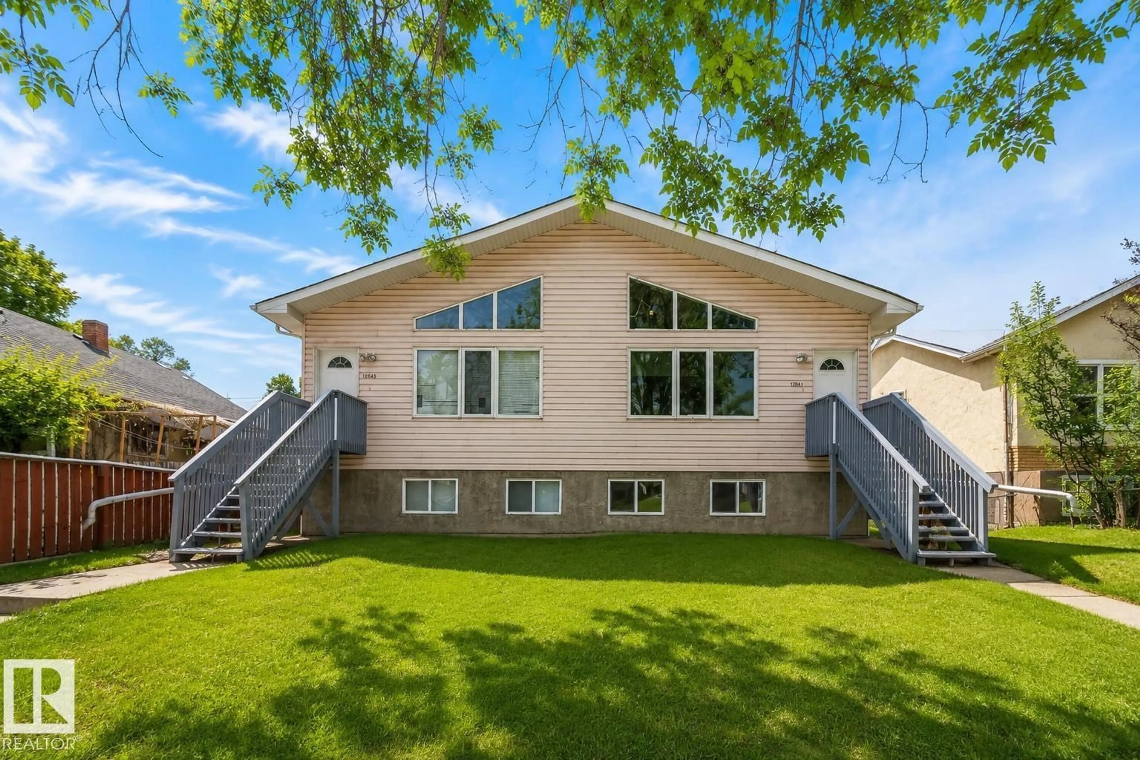 Home with vinyl exterior material, mountain view for 12041/43 67 ST, Edmonton Alberta T5B1M4