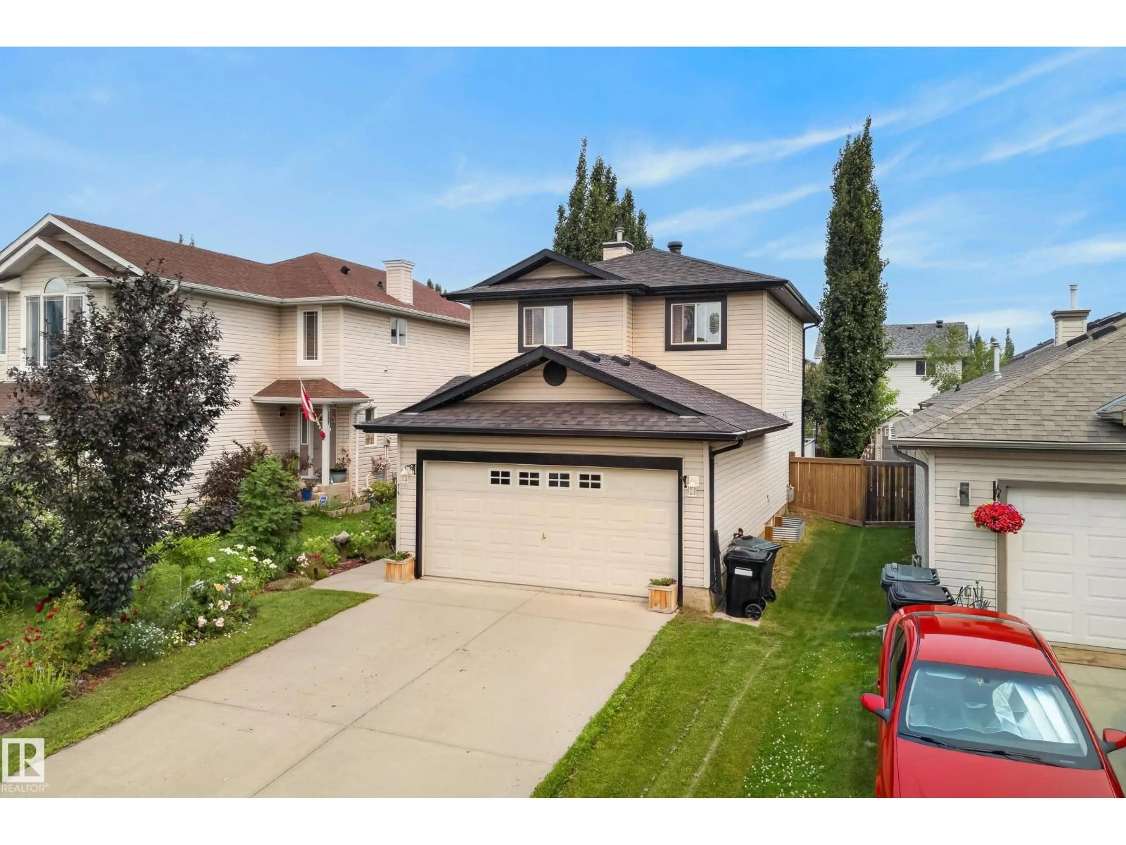 A pic from outside/outdoor area/front of a property/back of a property/a pic from drone, street for 76 LEYLAND WY, Spruce Grove Alberta T7X4P2