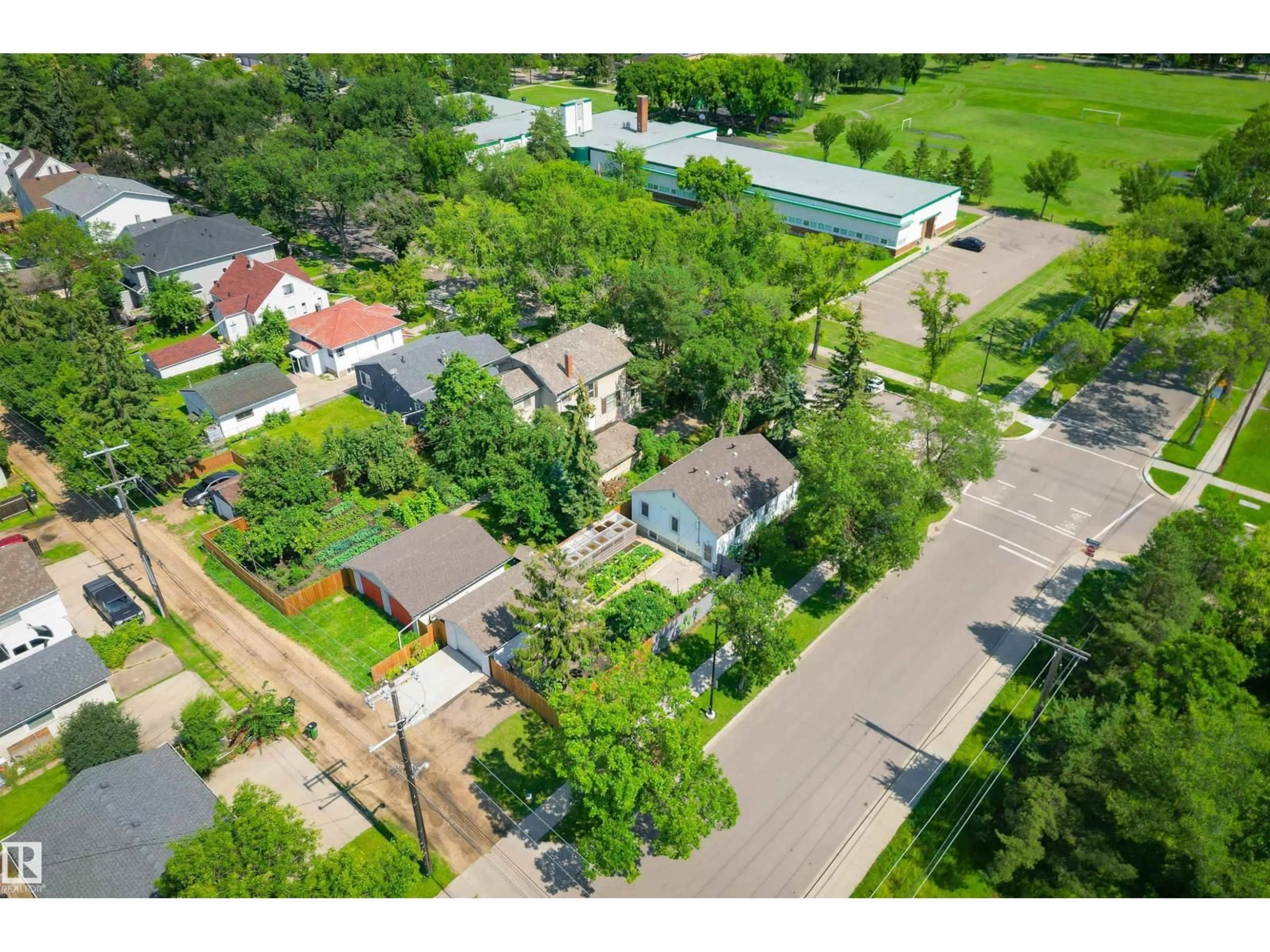 A pic from outside/outdoor area/front of a property/back of a property/a pic from drone, street for NW - 11502 127 ST, Edmonton Alberta T5M0V3