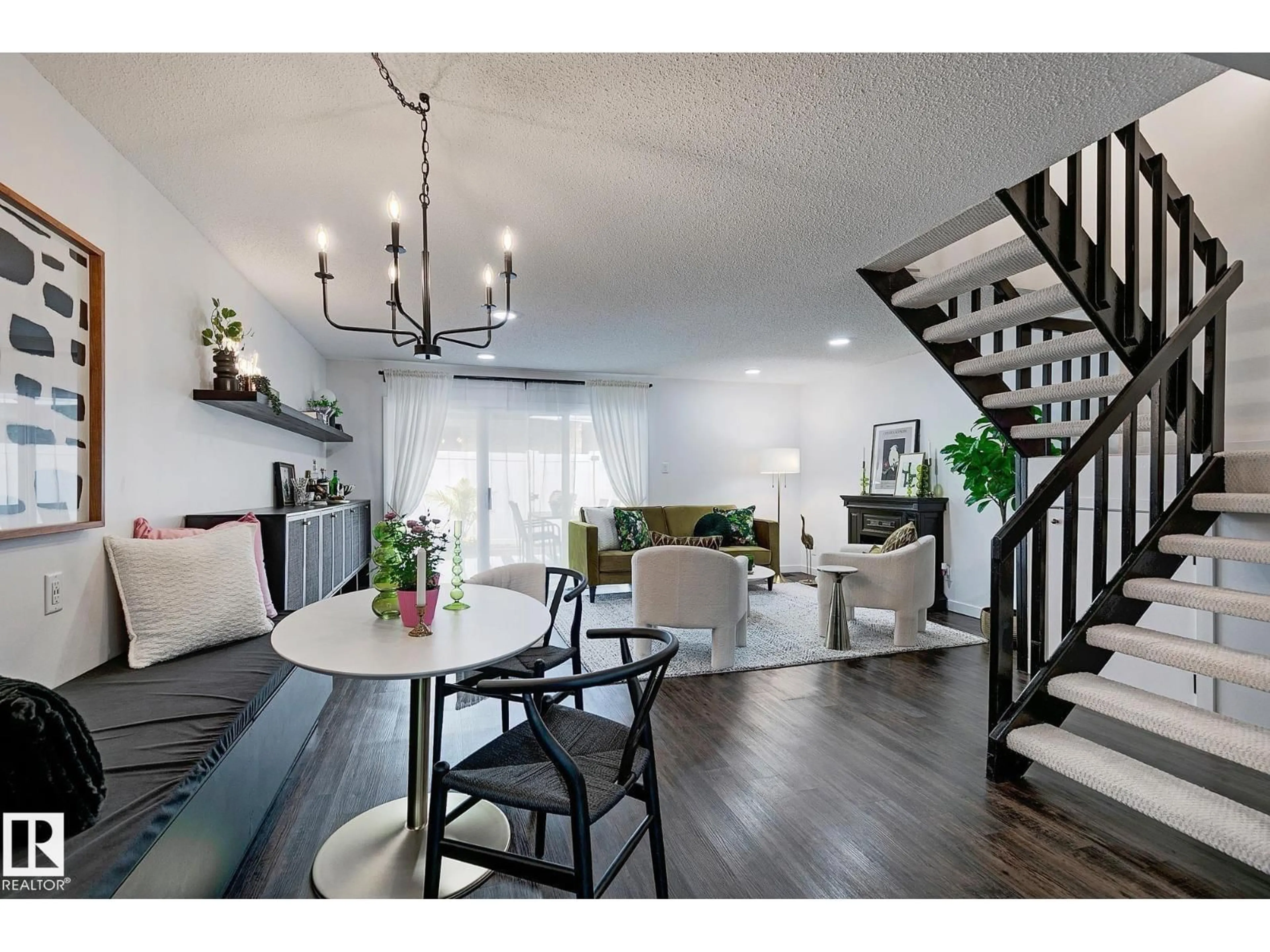 Living room with furniture, wood/laminate floor for 19F MEADOWLARK VG NW, Edmonton Alberta T5R5X3
