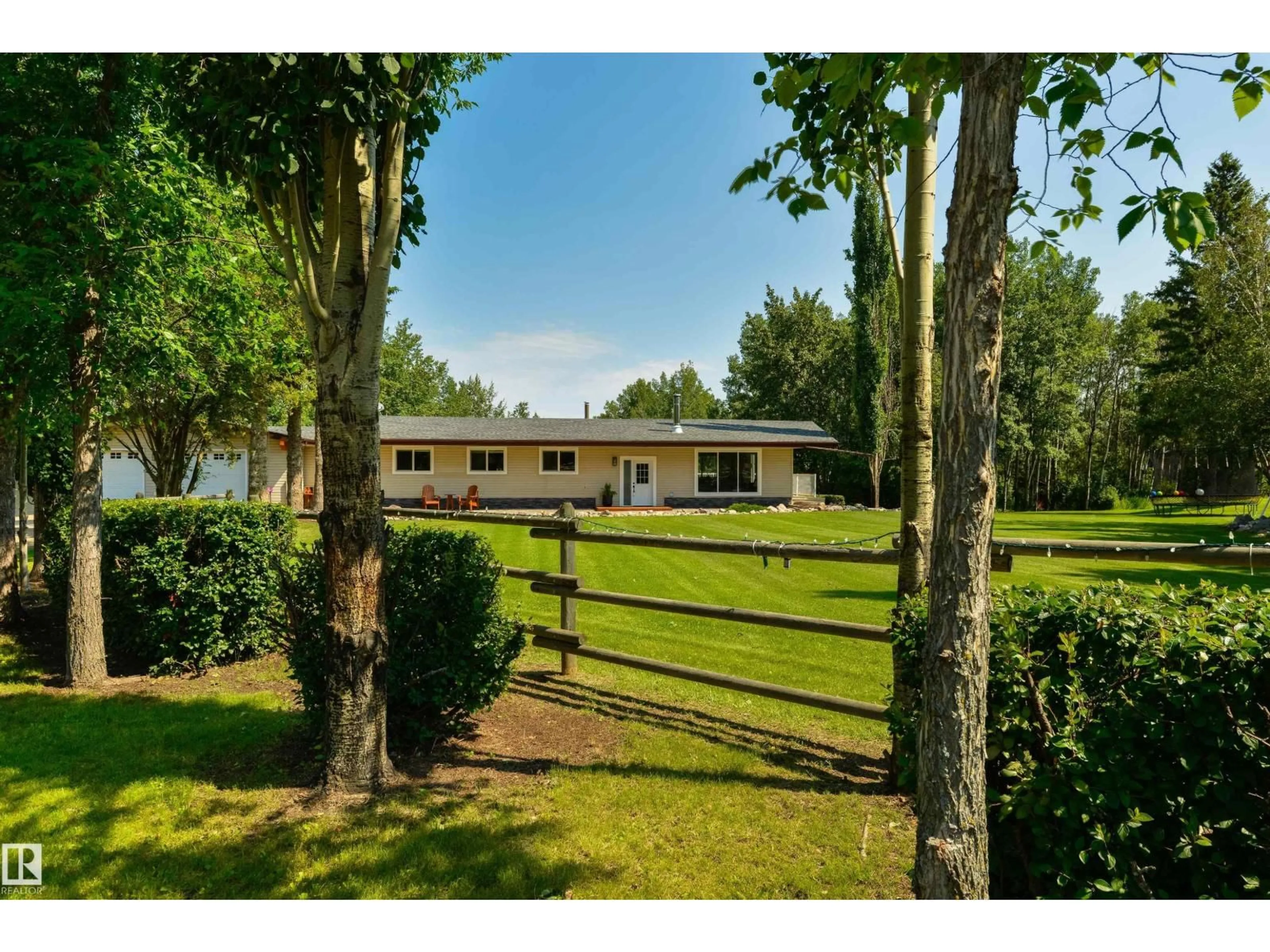 A pic from outside/outdoor area/front of a property/back of a property/a pic from drone, forest/trees view for 22 54108 RGE ROAD 280, Rural Parkland County Alberta T7X3V3