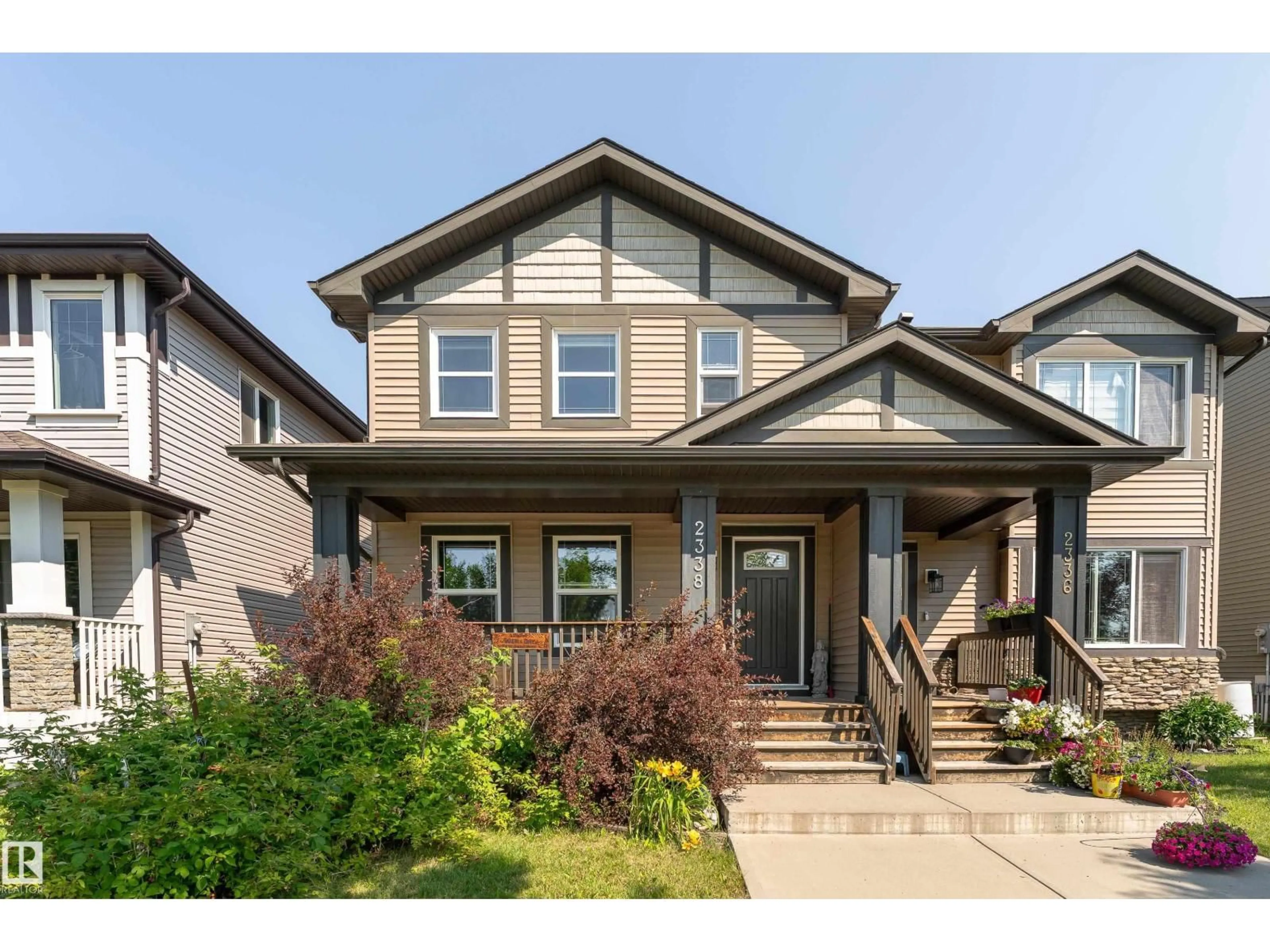 Home with vinyl exterior material, street for 2338 GLENRIDDING BV, Edmonton Alberta T6W3K5