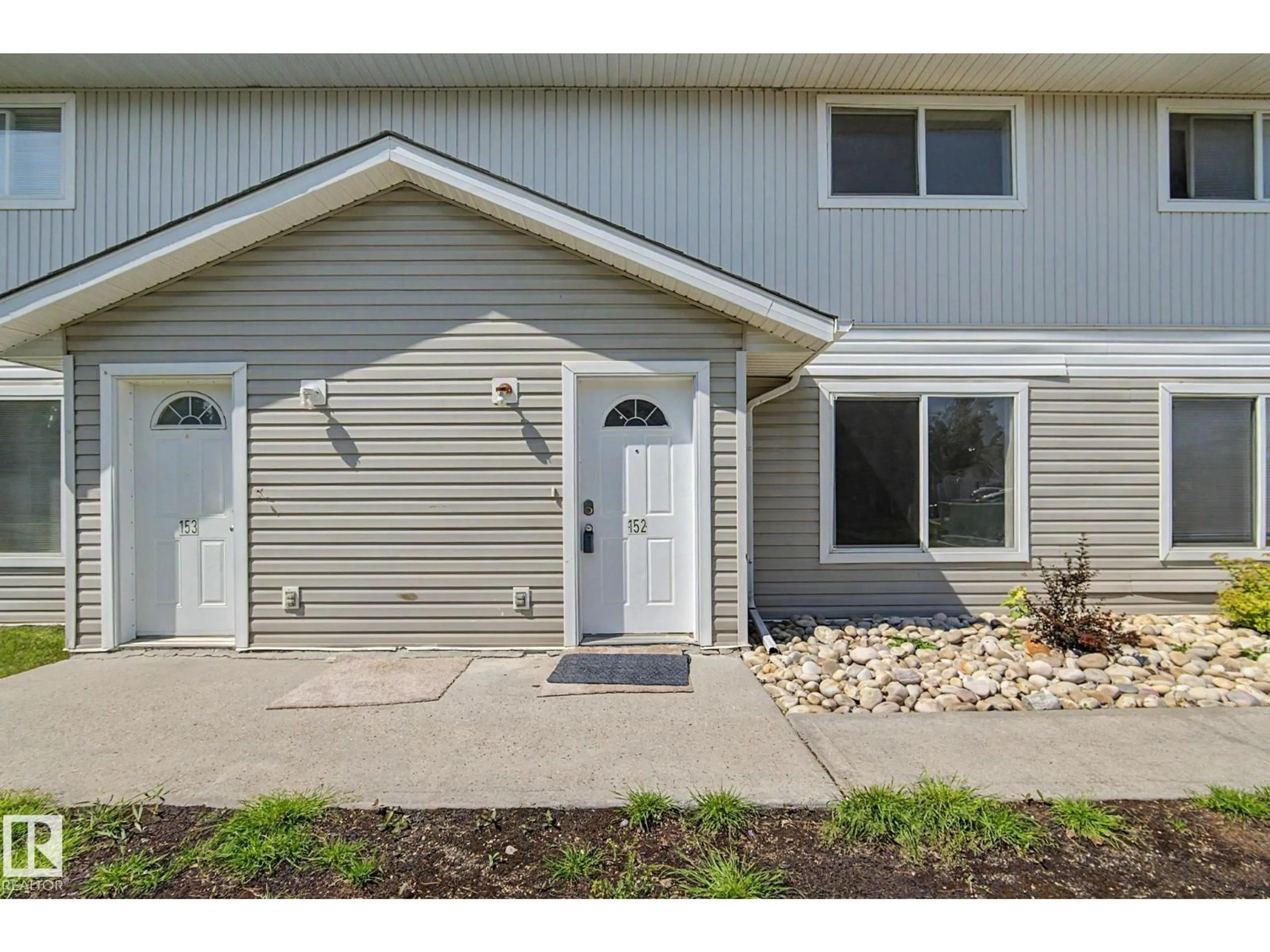 Home with vinyl exterior material, street for 152 180 BRIDGEPORT BV, Leduc Alberta T9E8S1