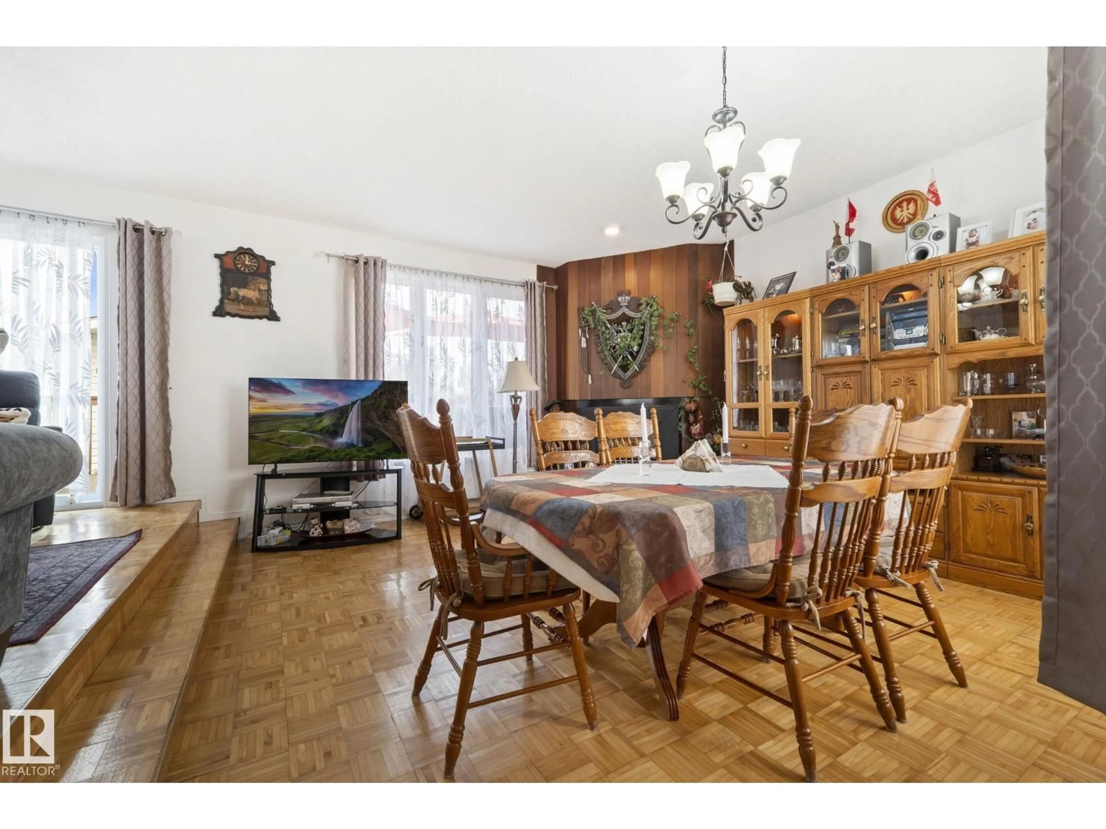 Dining room, wood/laminate floor for 8704 43 AV, Edmonton Alberta T6K1A7