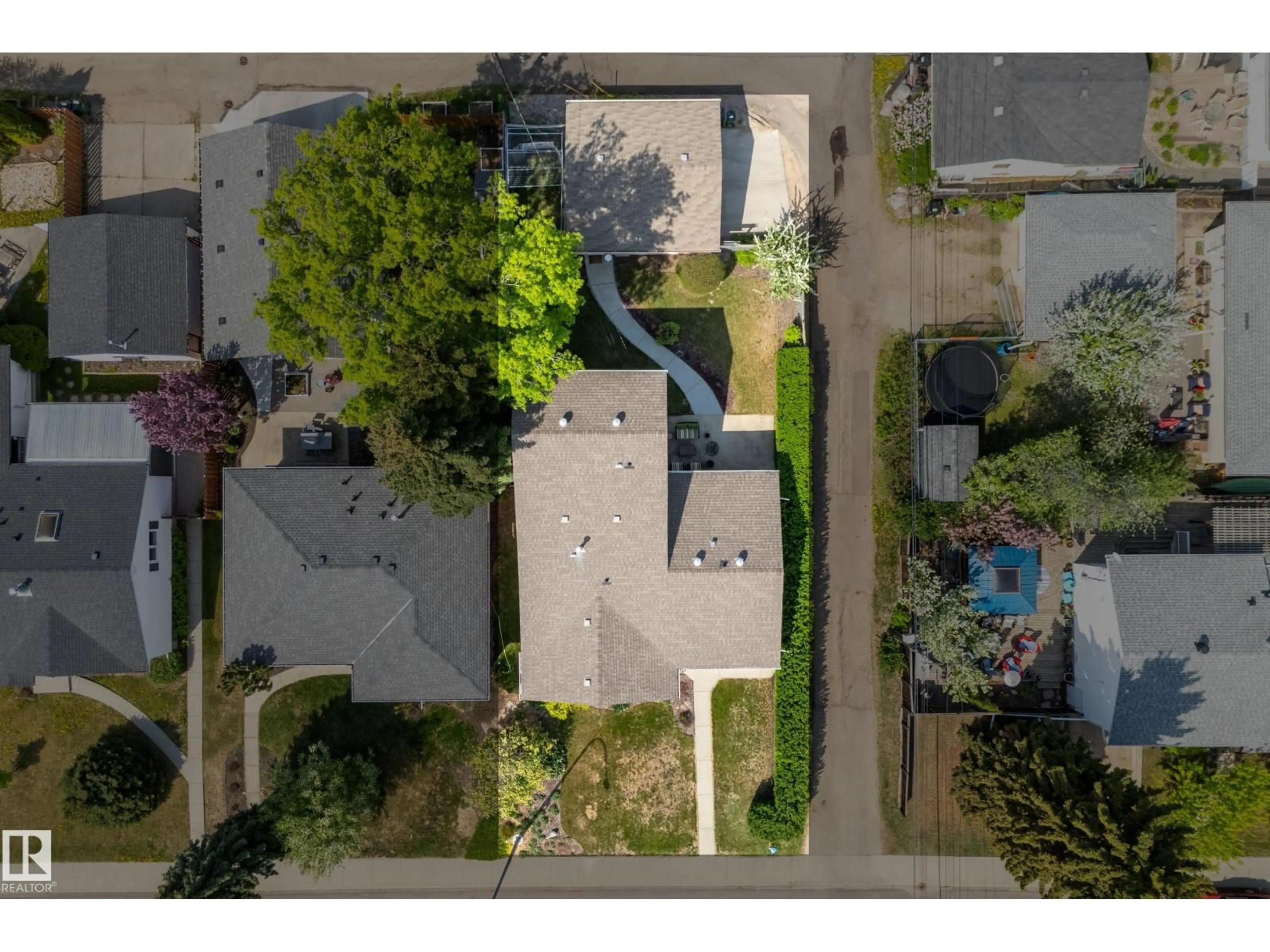 A pic from outside/outdoor area/front of a property/back of a property/a pic from drone, street for 9036 145 ST, Edmonton Alberta T5R0V2