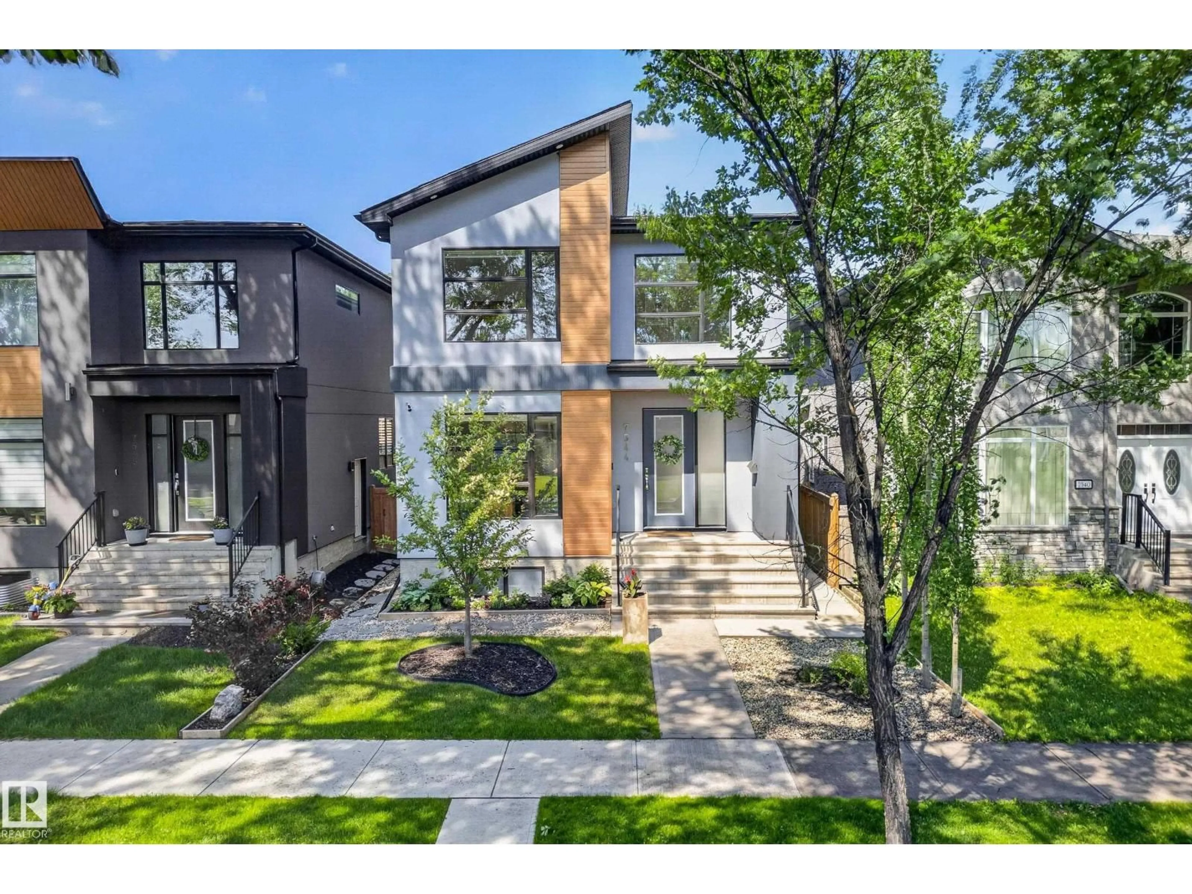 Home with brick exterior material, street for 7544 78 AV, Edmonton Alberta T6C0M7