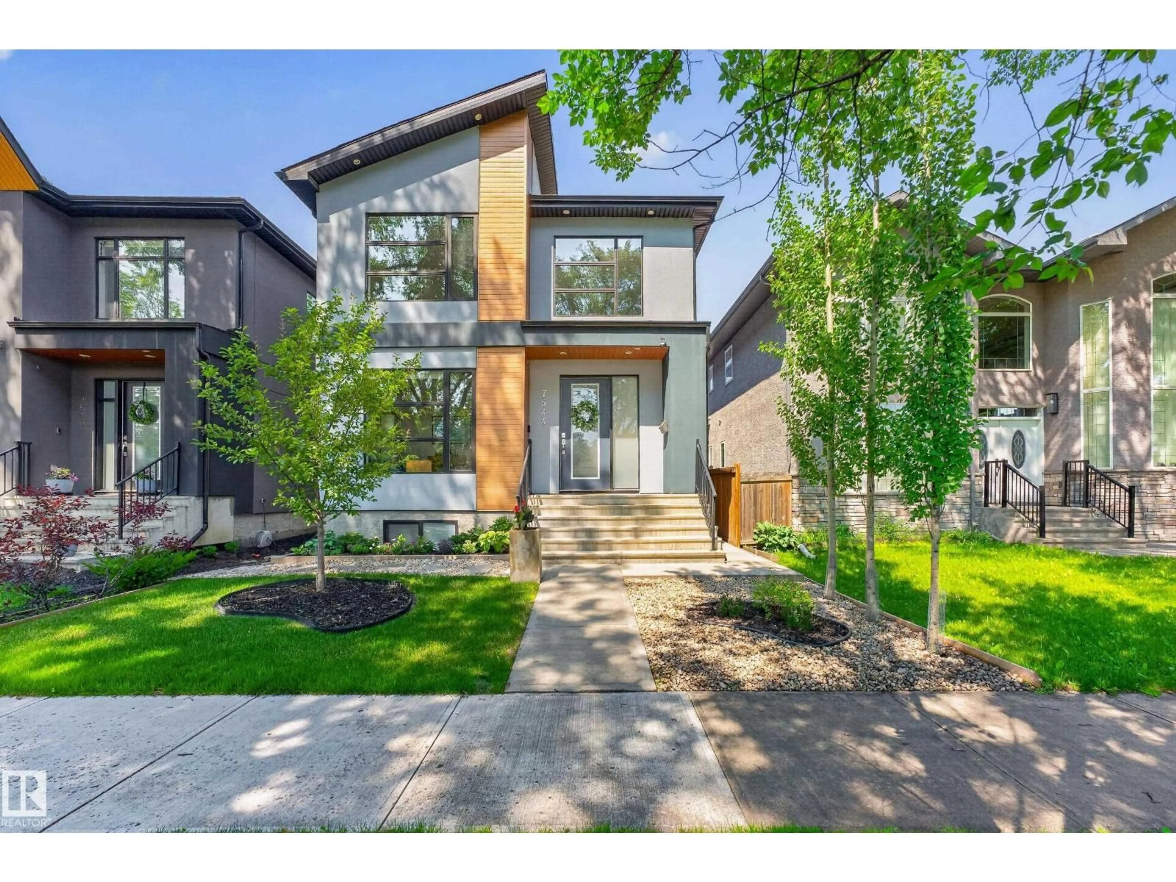 Home with brick exterior material, street for 7544 78 AV, Edmonton Alberta T6C0M7