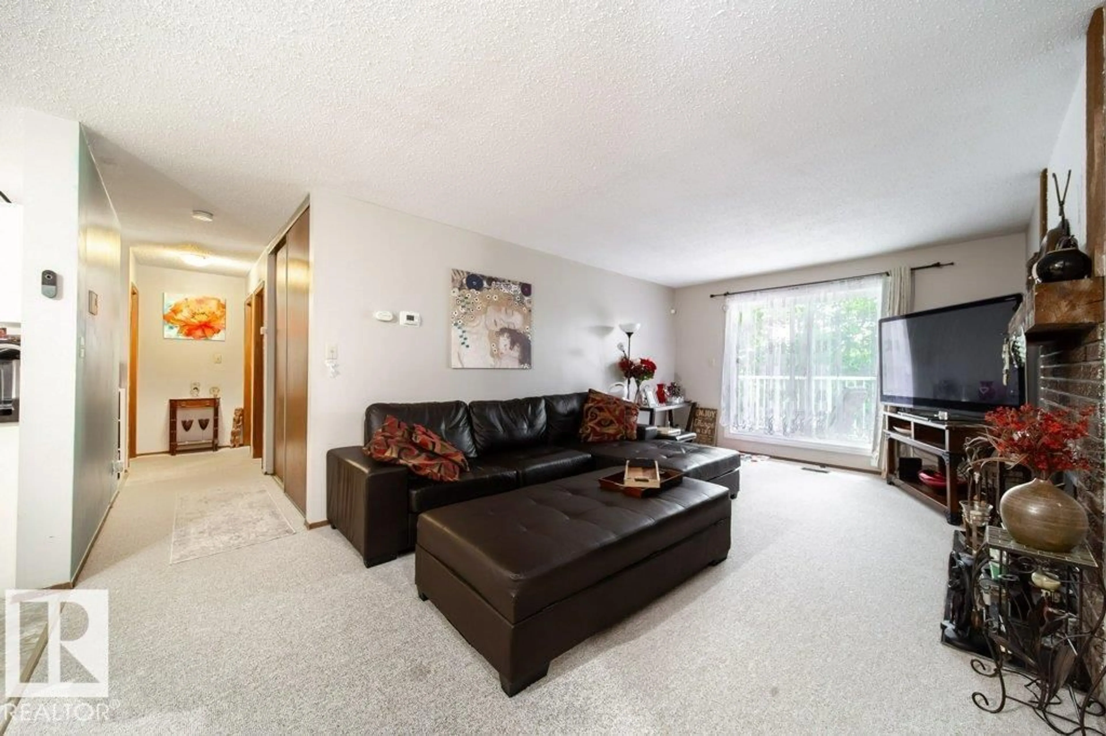 Living room with furniture, unknown for #307 - 6212 180 ST, Edmonton Alberta T5T2T2