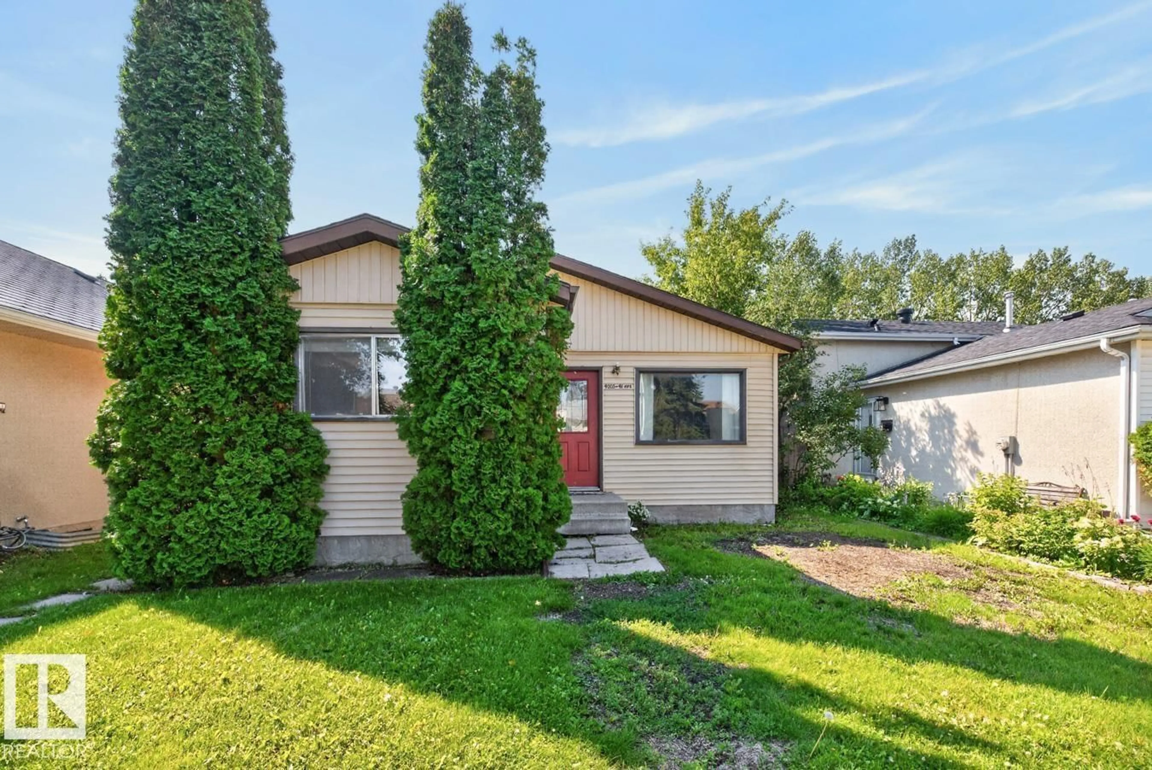 Home with vinyl exterior material, street for NW - 4003 41 AV, Edmonton Alberta T6L5K5