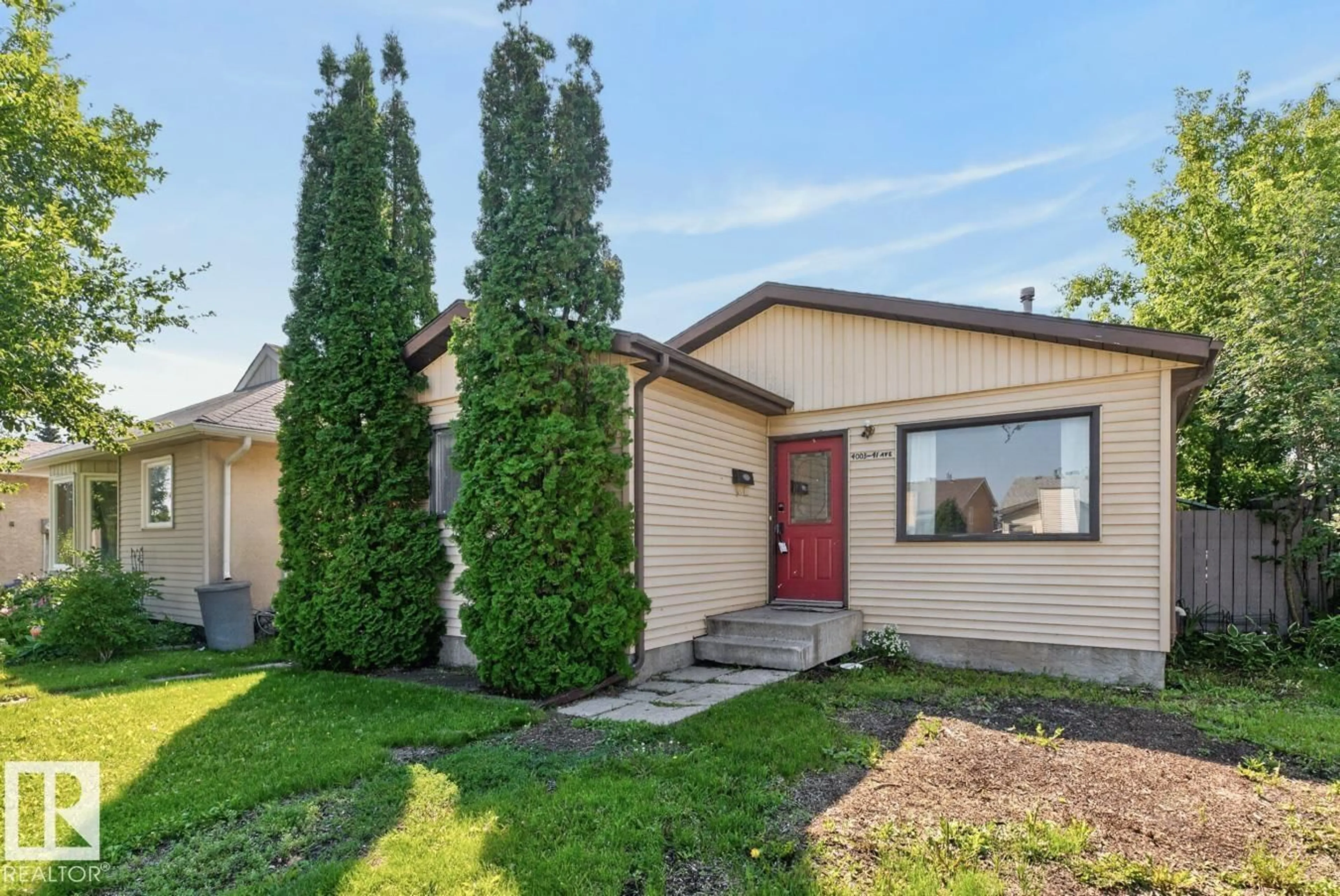 Home with vinyl exterior material, street for NW - 4003 41 AV, Edmonton Alberta T6L5K5