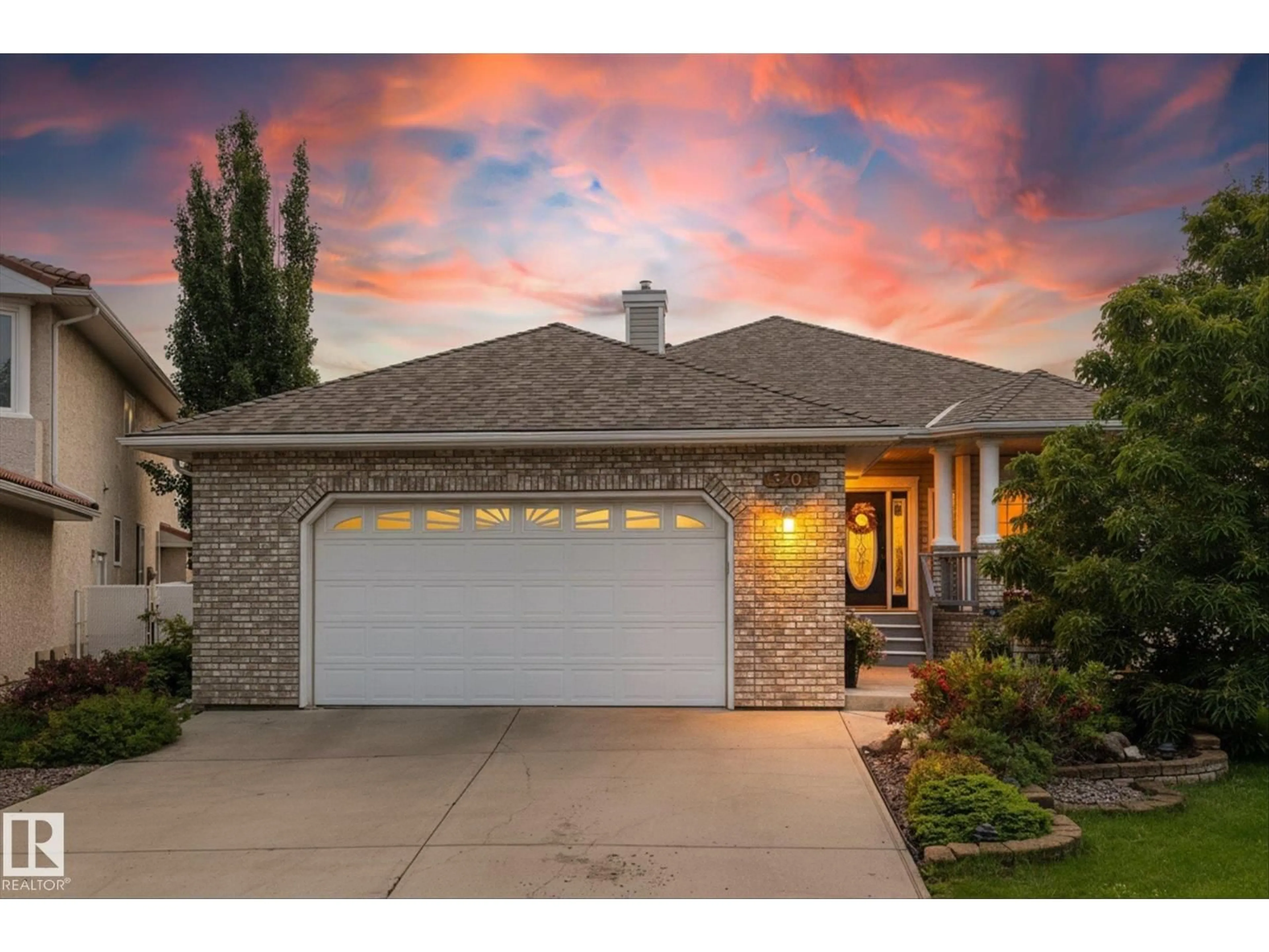 Home with brick exterior material, street for 8704 165 AV, Edmonton Alberta T5Z2W9