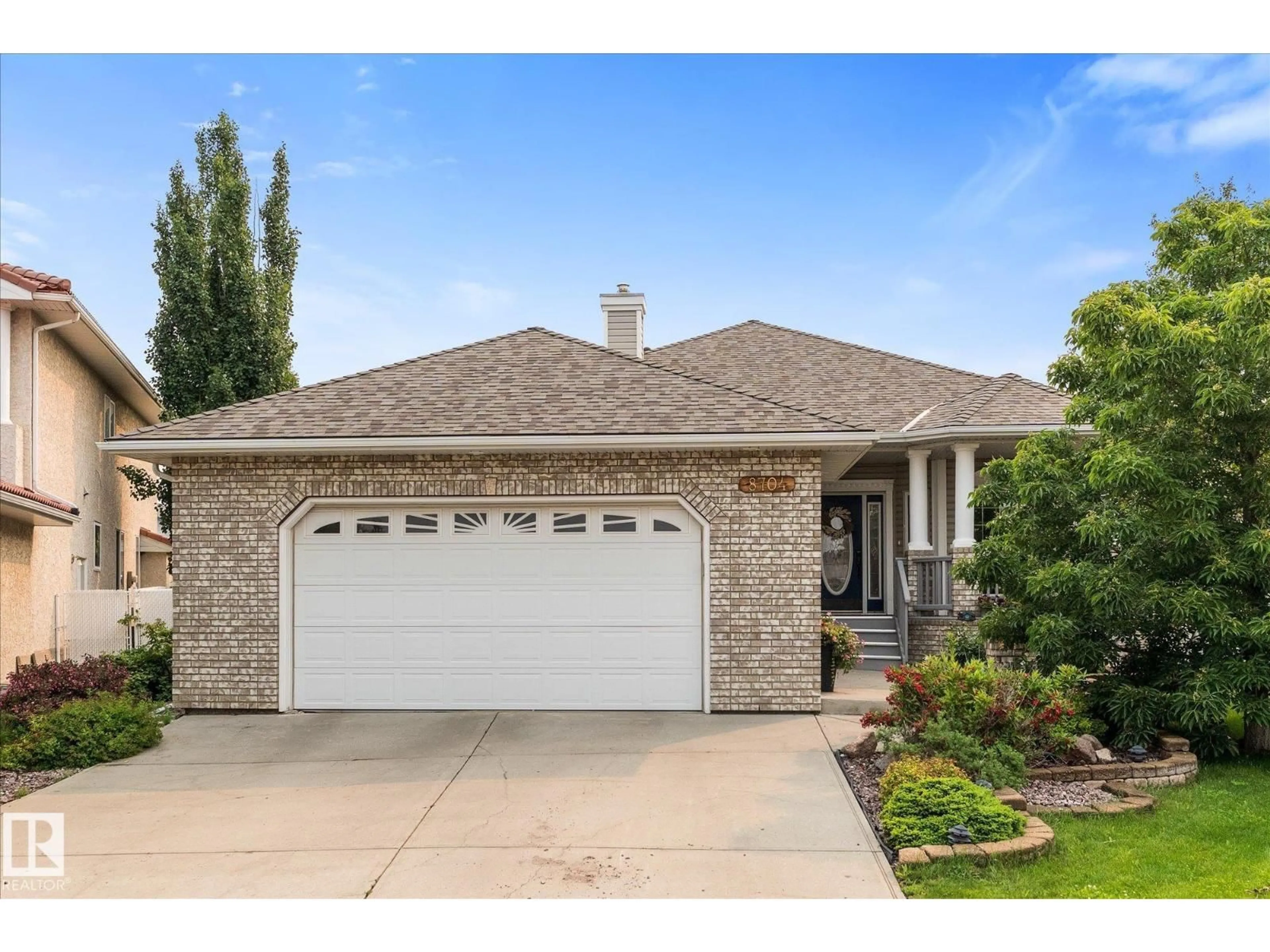 Home with brick exterior material, street for 8704 165 AV, Edmonton Alberta T5Z2W9