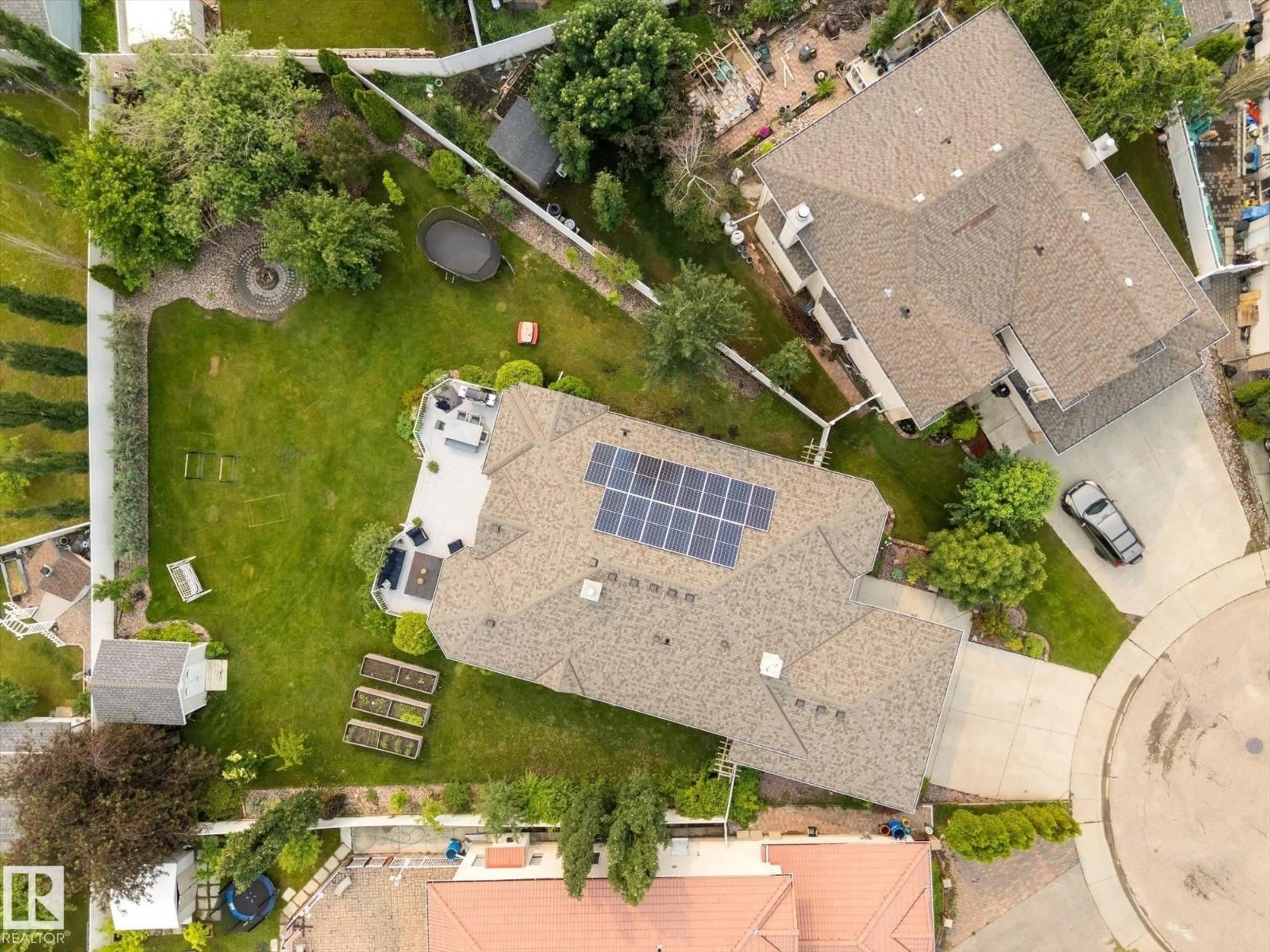 A pic from outside/outdoor area/front of a property/back of a property/a pic from drone, street for 8704 165 AV, Edmonton Alberta T5Z2W9