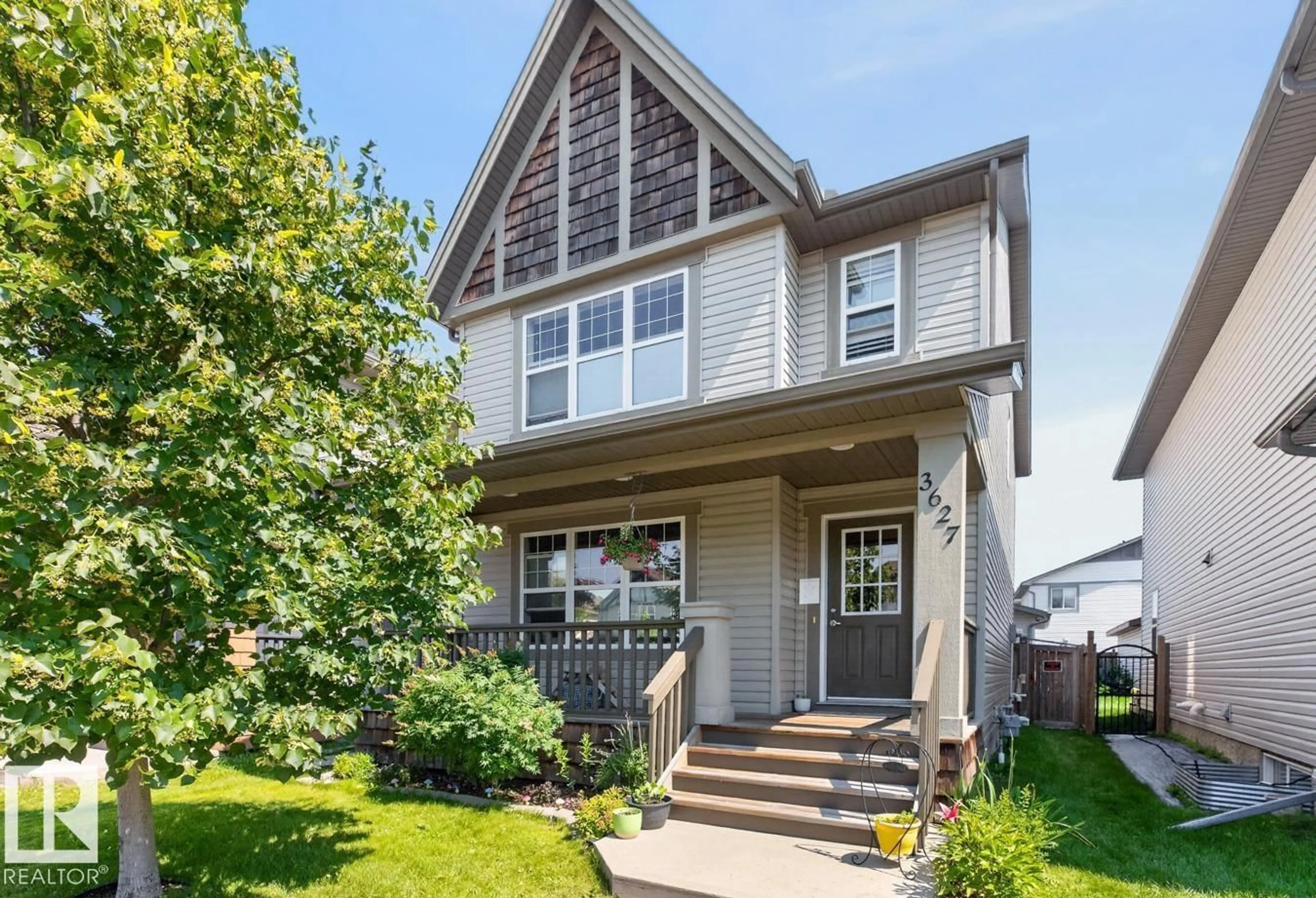 Home with vinyl exterior material, street for 3627 12 ST, Edmonton Alberta T6T0G1