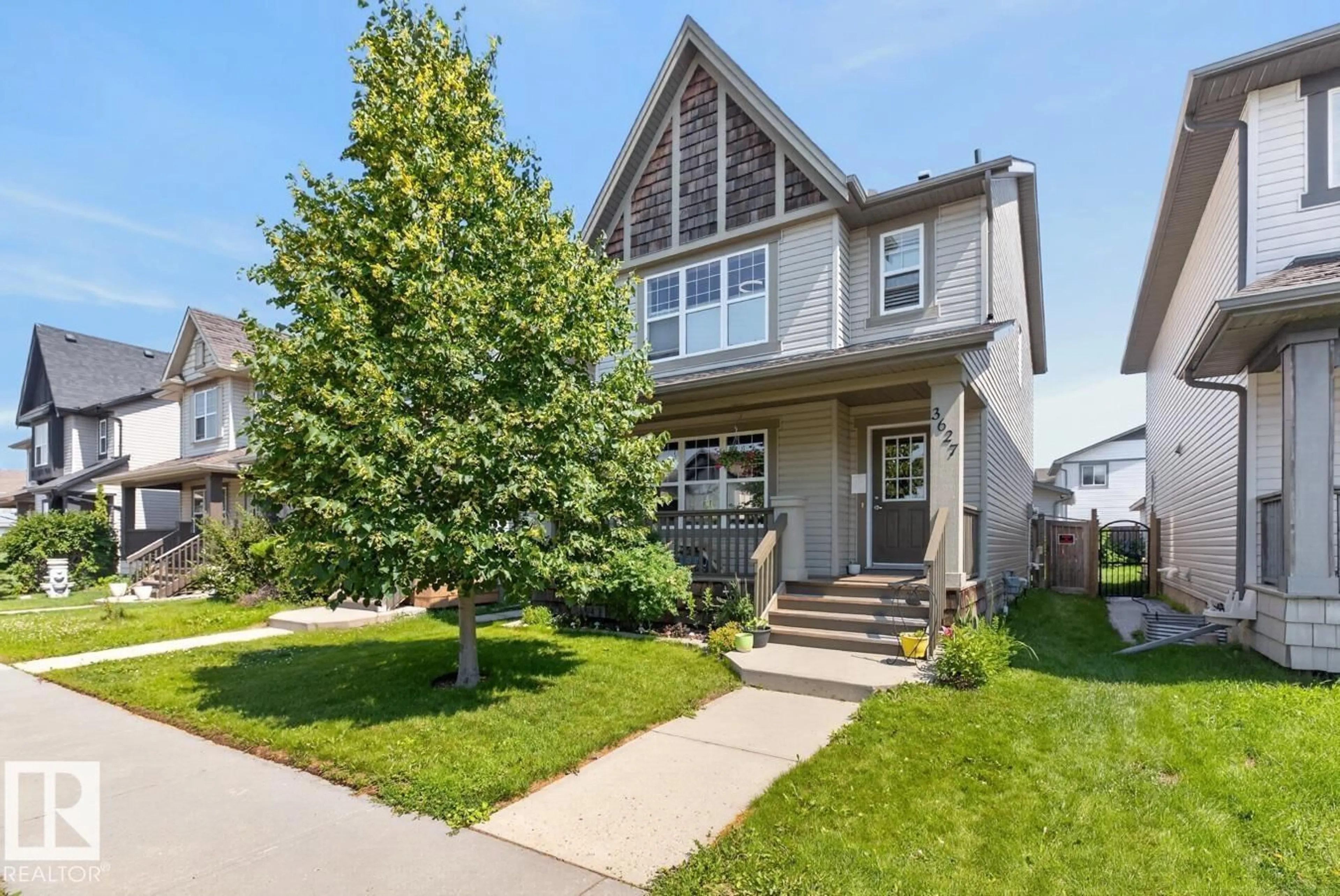 Home with vinyl exterior material, street for 3627 12 ST, Edmonton Alberta T6T0G1