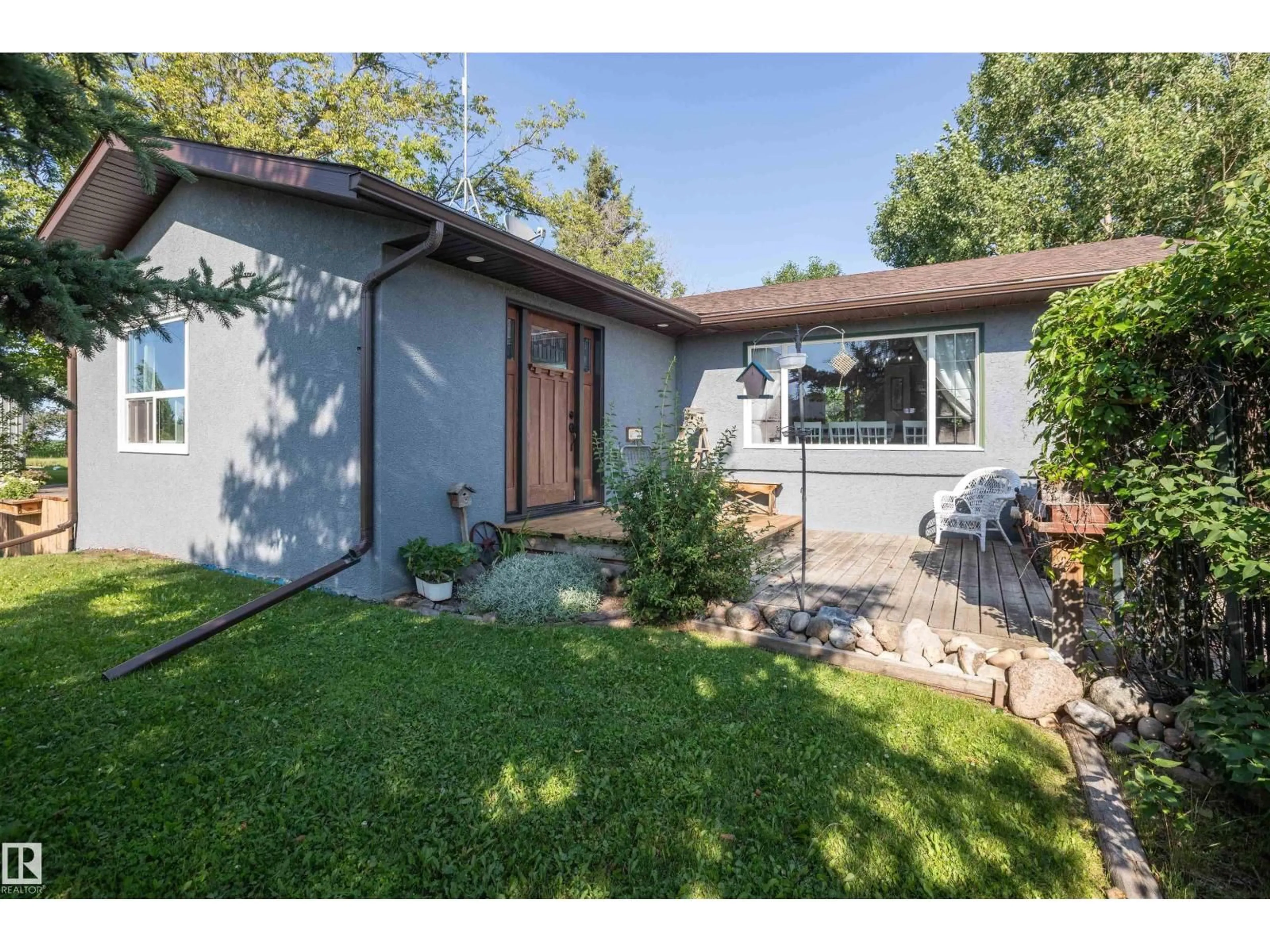 Home with vinyl exterior material, street for 62503B HWY 769, Rural Barrhead County Alberta T0G1R0