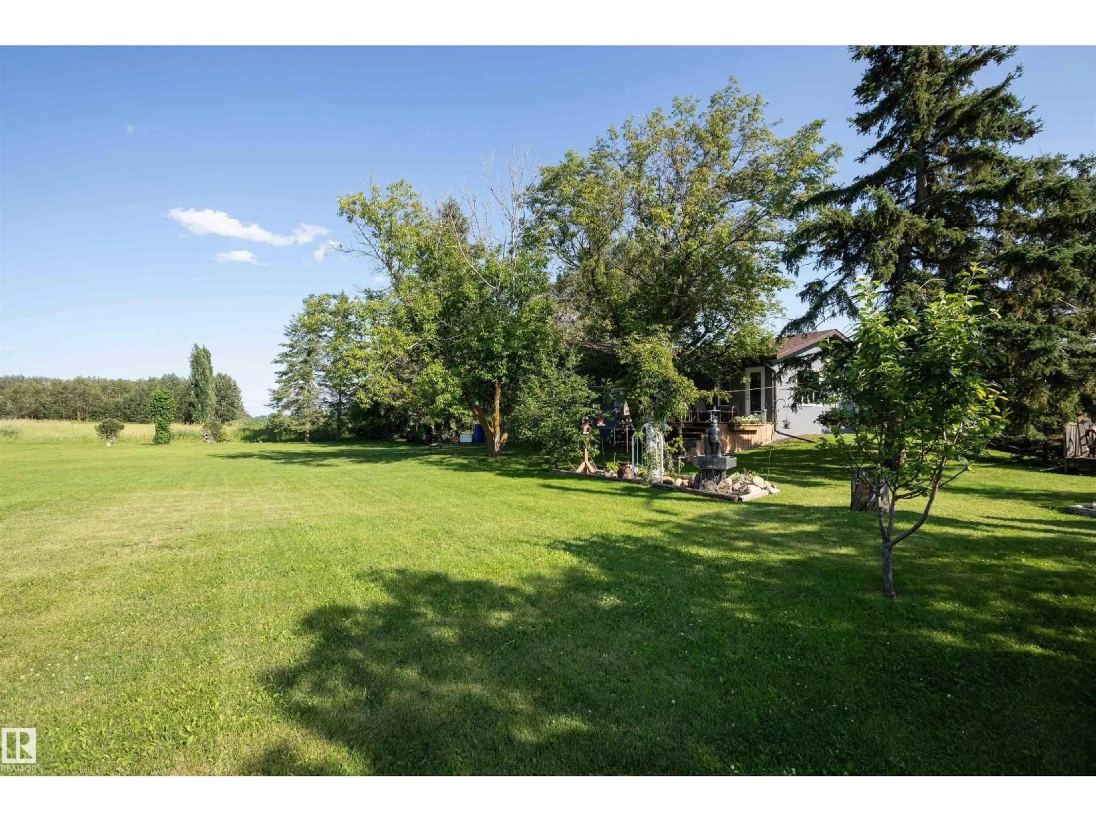 A pic from outside/outdoor area/front of a property/back of a property/a pic from drone, unknown for 62503B HWY 769, Rural Barrhead County Alberta T0G1R0