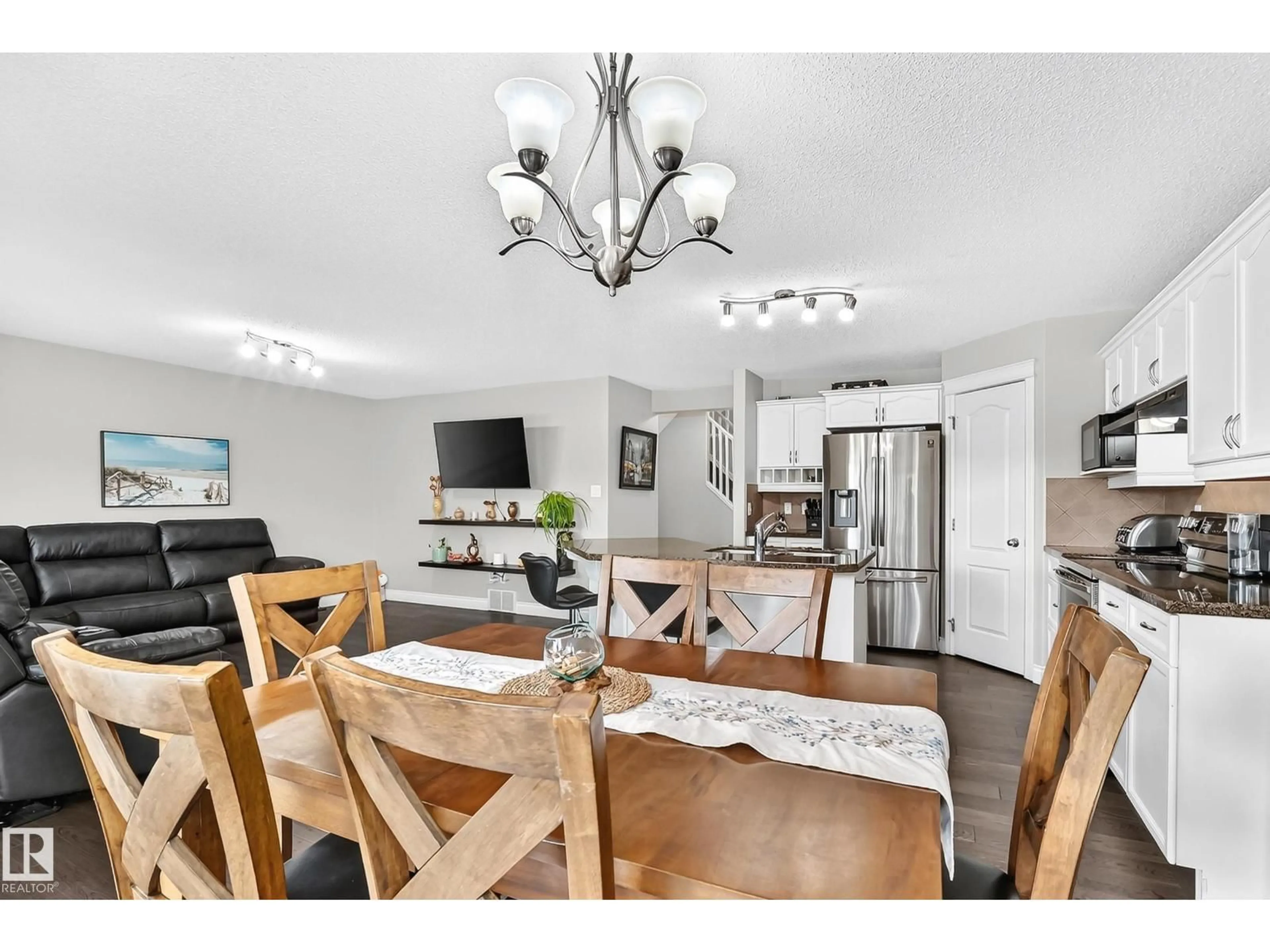 Open concept kitchen, wood/laminate floor for NW - 17803 89 ST, Edmonton Alberta T5Z0A6