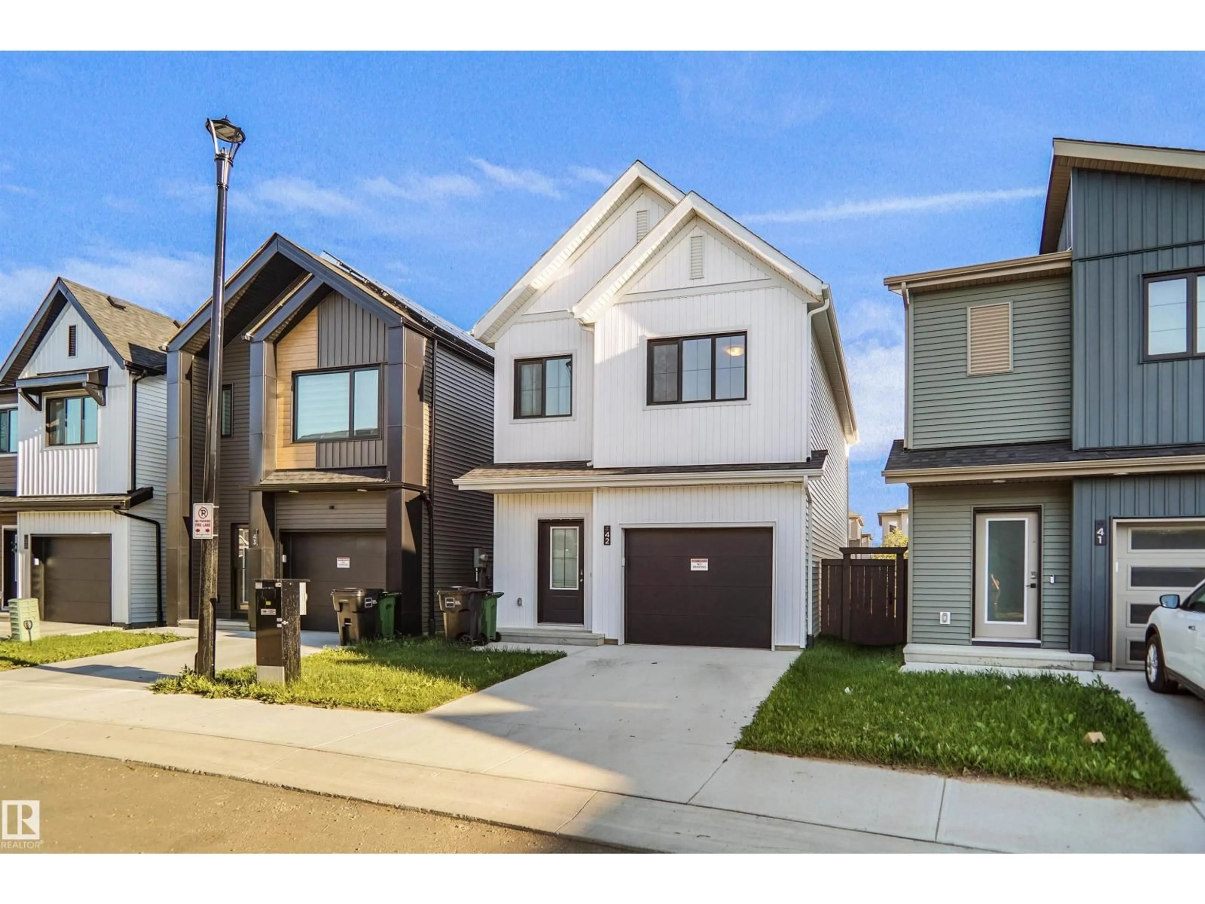 Home with brick exterior material, street for #42 - 19904 31 AV, Edmonton Alberta T6M3B9