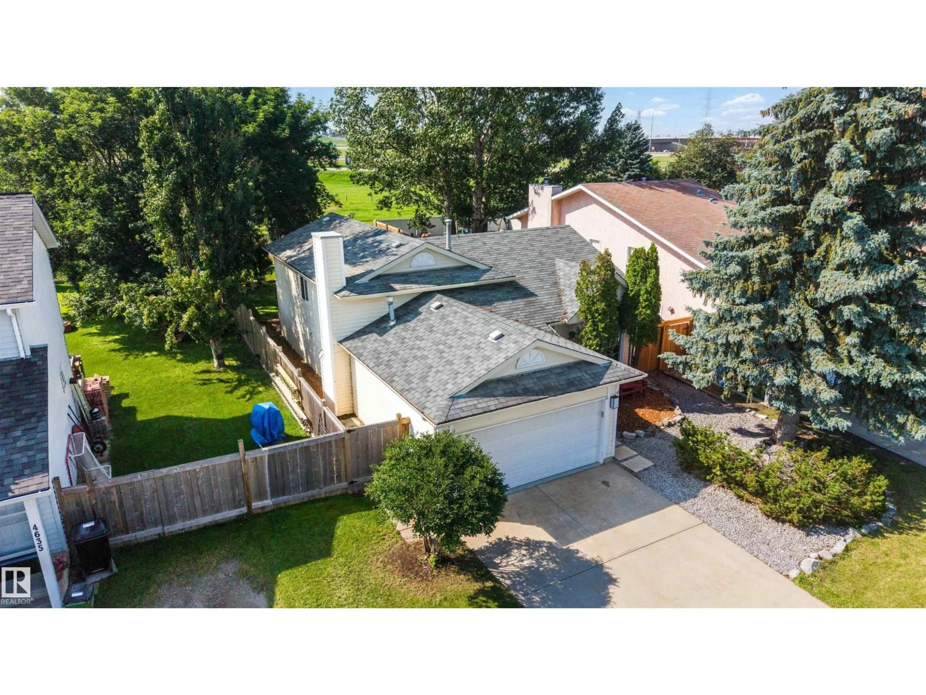 A pic from outside/outdoor area/front of a property/back of a property/a pic from drone, street for 4639 10 AV, Edmonton Alberta T6L4S2