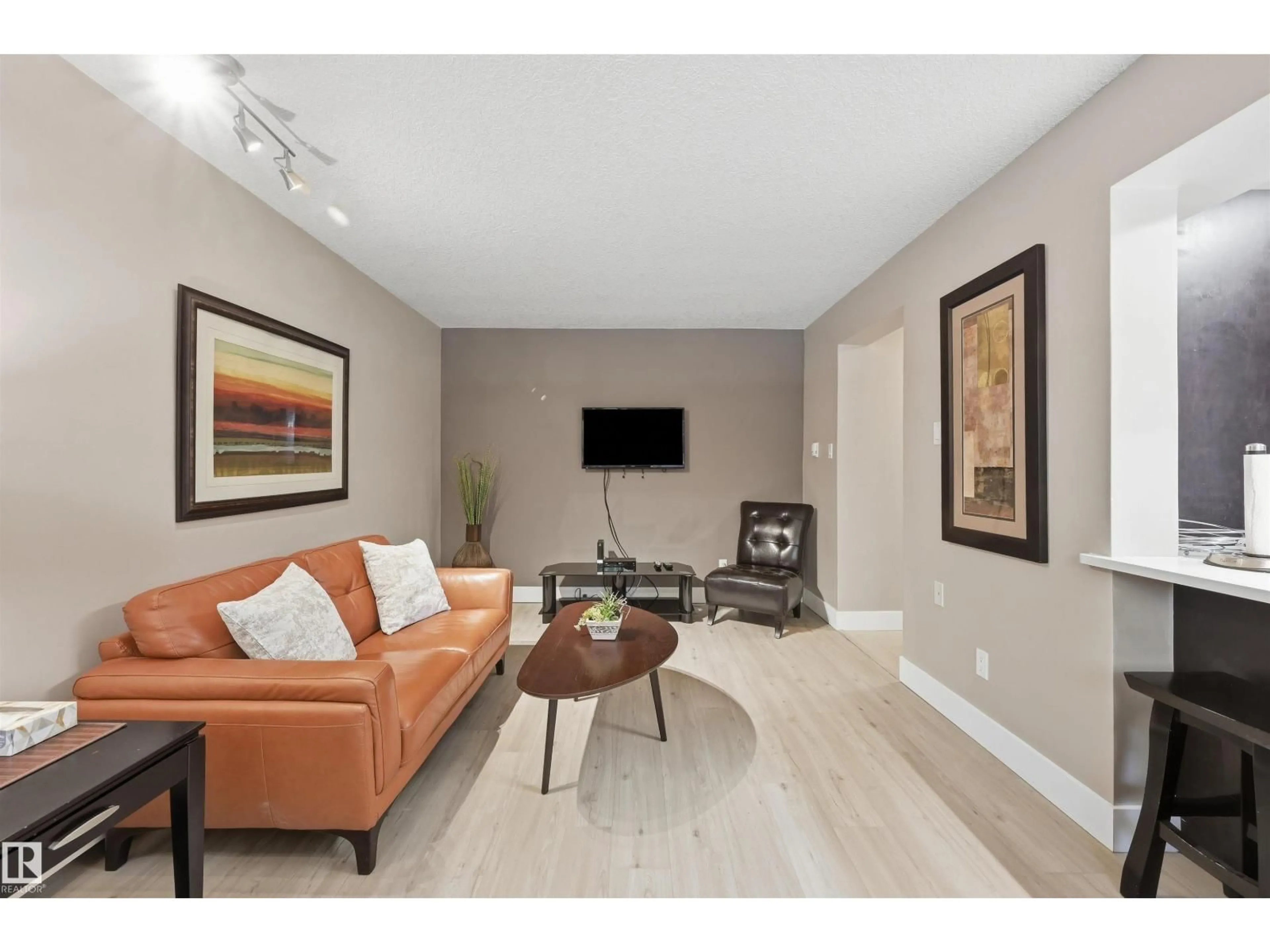 Living room with furniture, unknown for #1 - 10015 83 AV NW, Edmonton Alberta T6E2C3