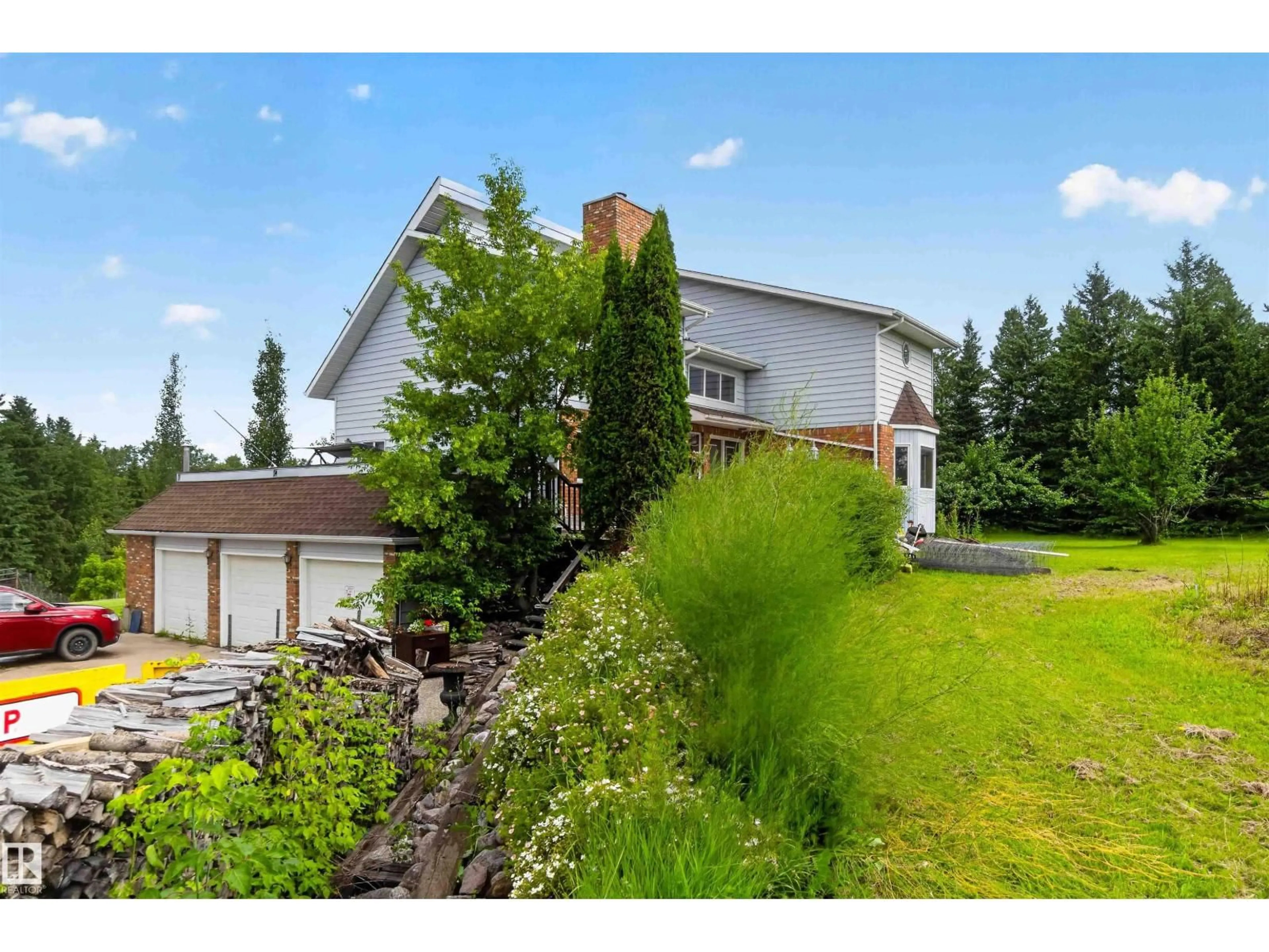 A pic from outside/outdoor area/front of a property/back of a property/a pic from drone, street for 53504 - 35 RGE ROAD 280, Rural Parkland County Alberta T7X3V6