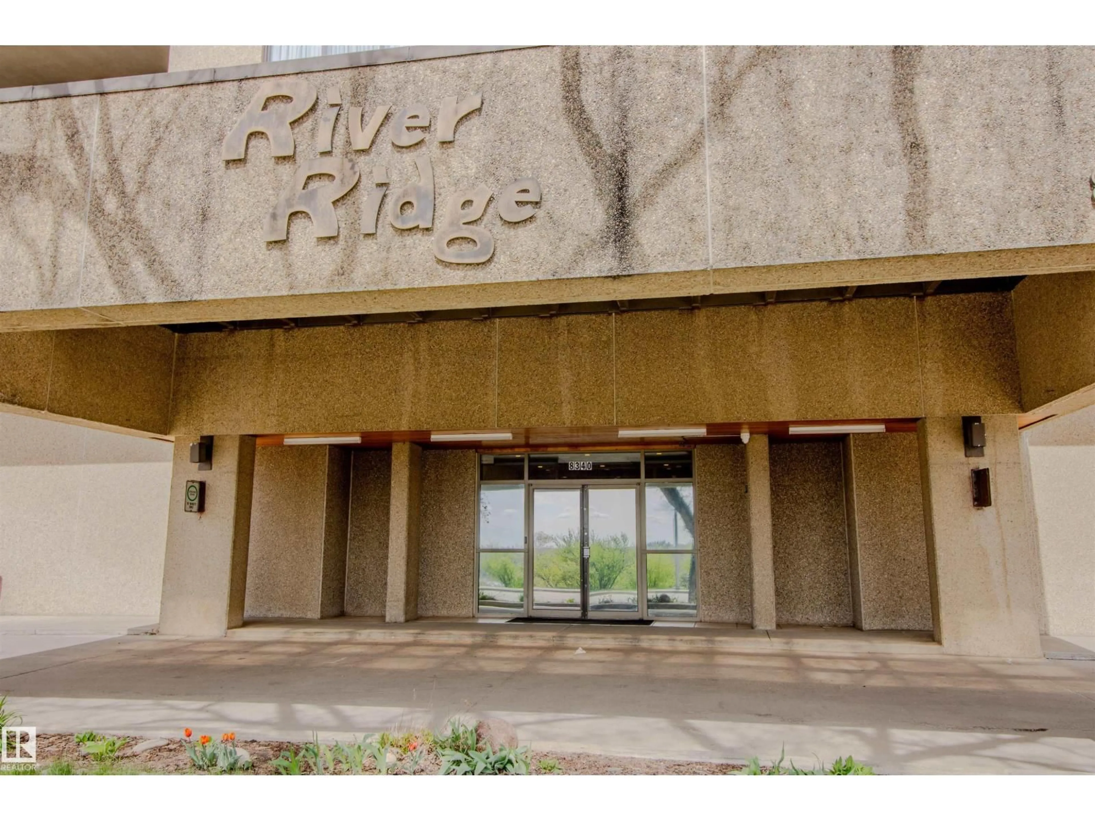 Indoor foyer for 202 - 8340 JASPER AV, Edmonton Alberta T5H4C6
