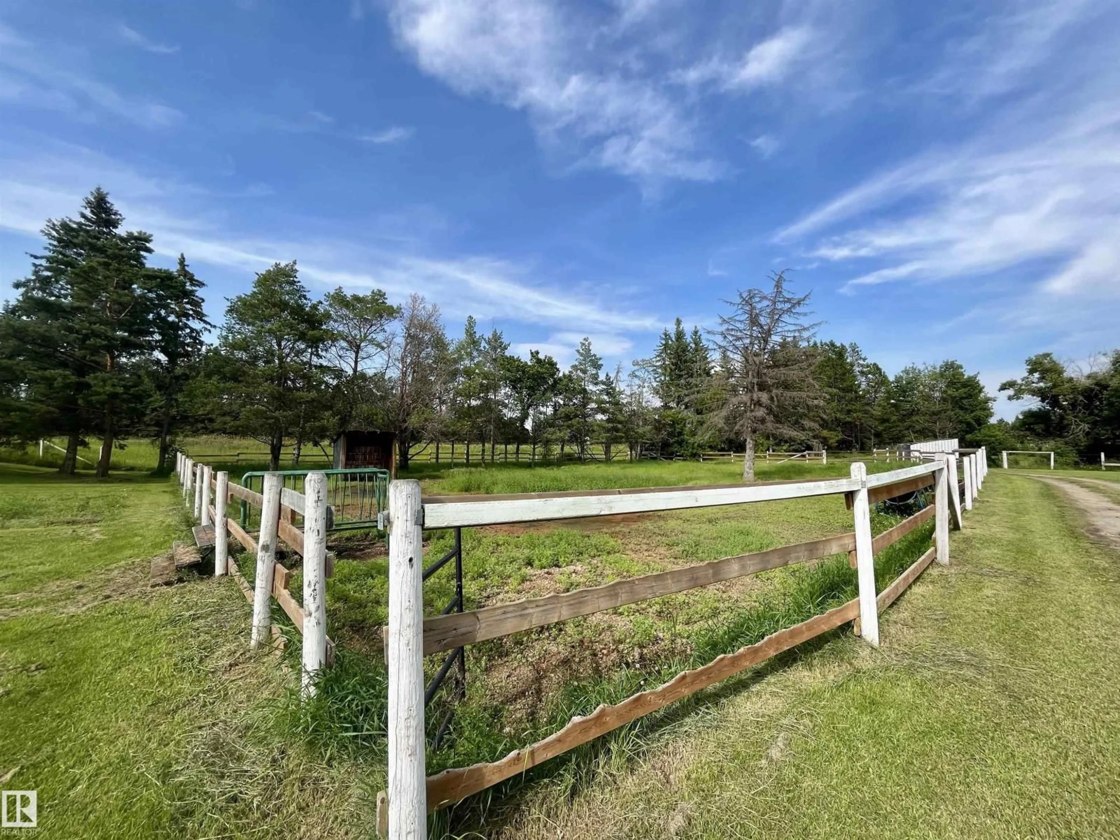 A pic from outside/outdoor area/front of a property/back of a property/a pic from drone, forest/trees view for A - 3115 HGHWAY, Rural Parkland County Alberta T0E0N0