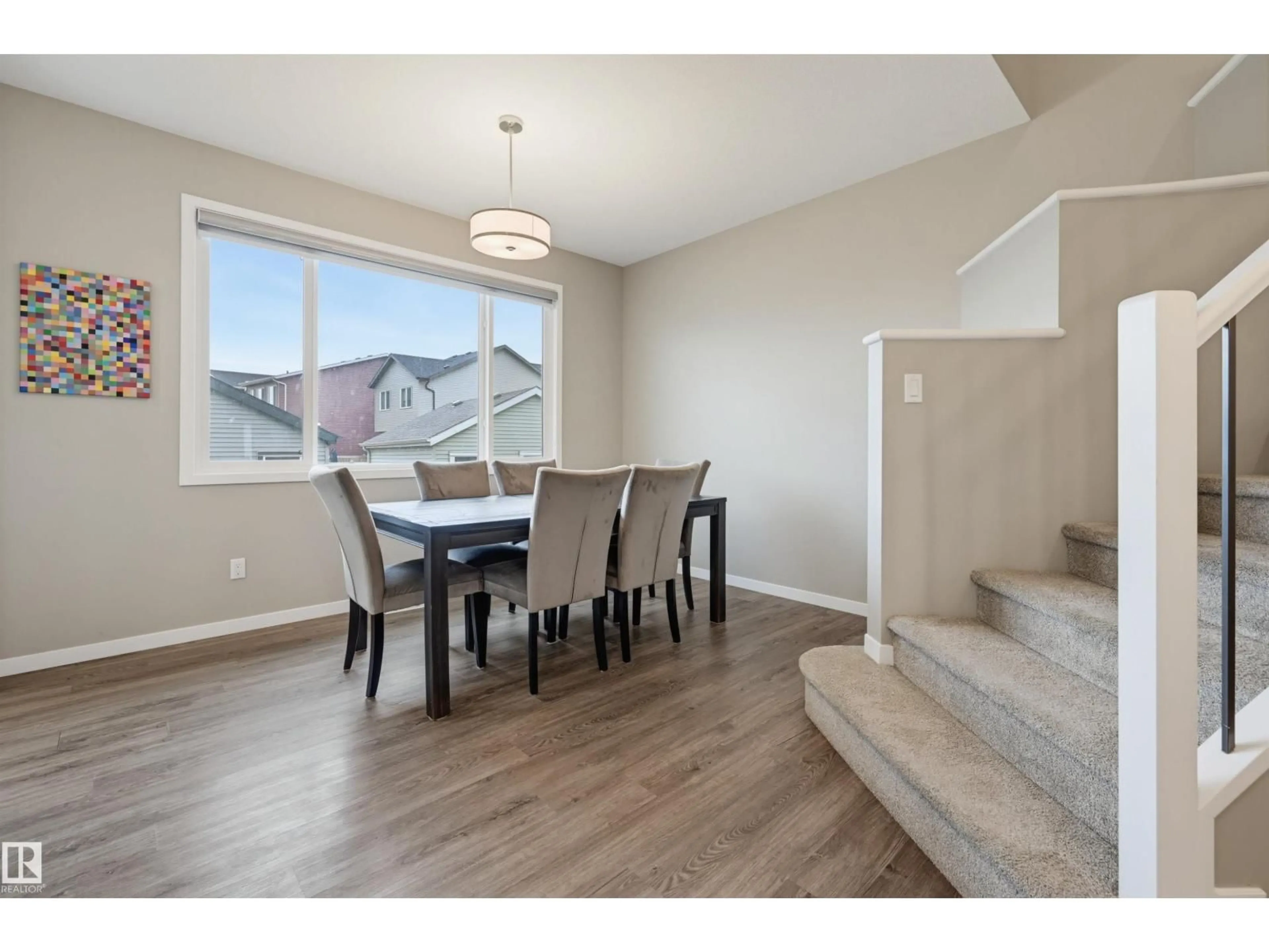 Dining room, wood/laminate floor for 5175 EDGEMONT BV, Edmonton Alberta T6M1J7