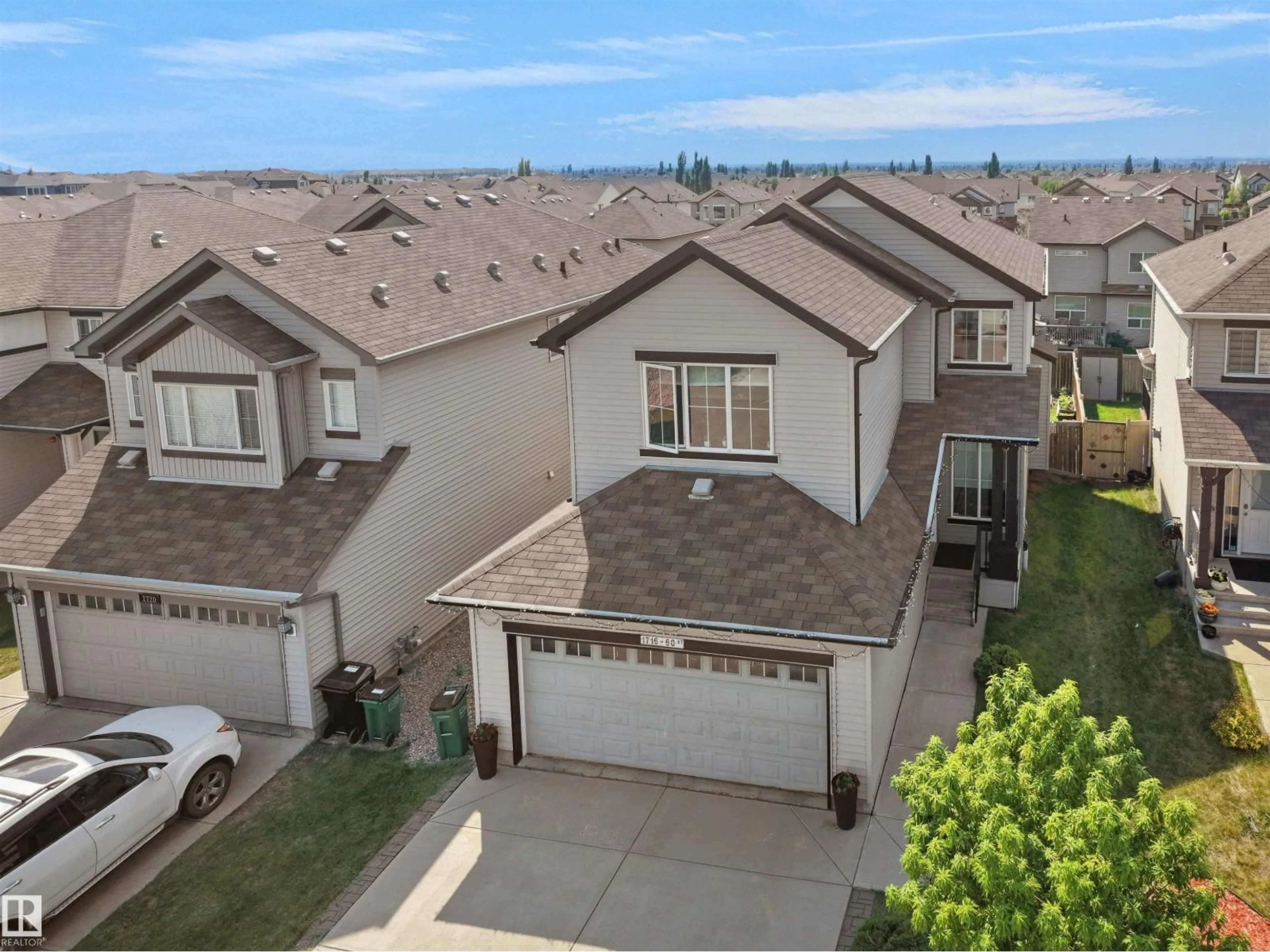 A pic from outside/outdoor area/front of a property/back of a property/a pic from drone, street for 1716 60 ST, Edmonton Alberta T6X0W4