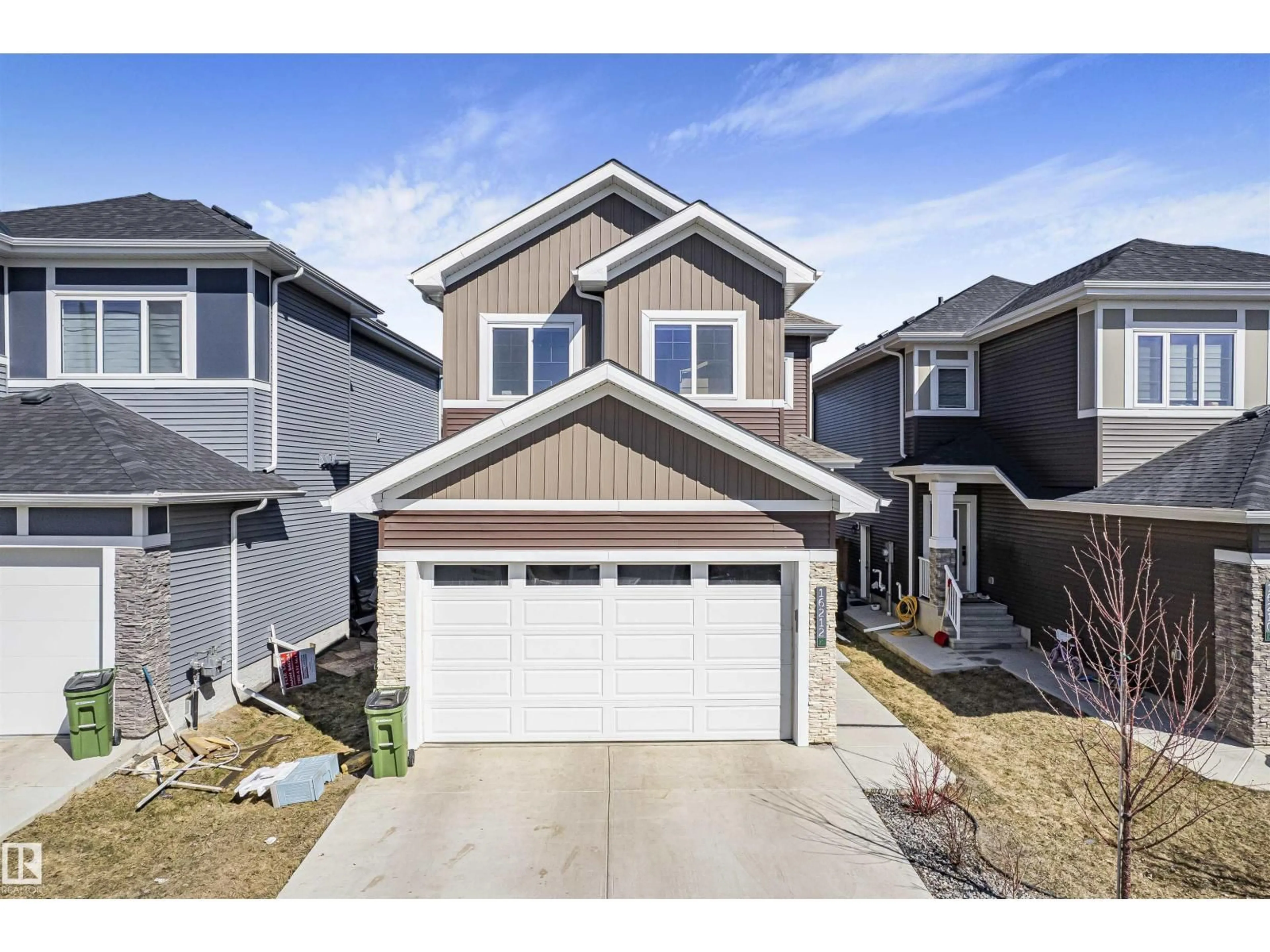 Home with vinyl exterior material, street for SW - 16212 32 AV, Edmonton Alberta T6W4P2