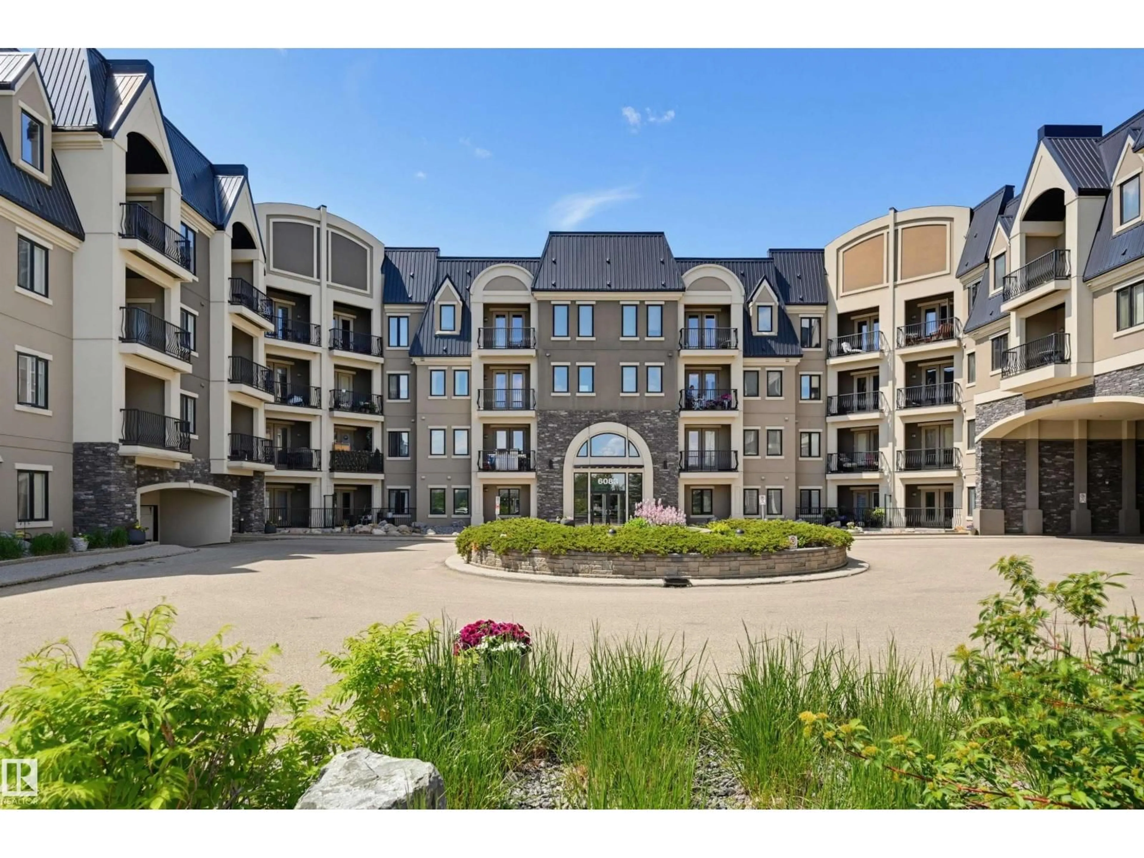 A pic from outside/outdoor area/front of a property/back of a property/a pic from drone, unknown for 6083 - 110 MAYNARD WY, Edmonton Alberta T6R0S5