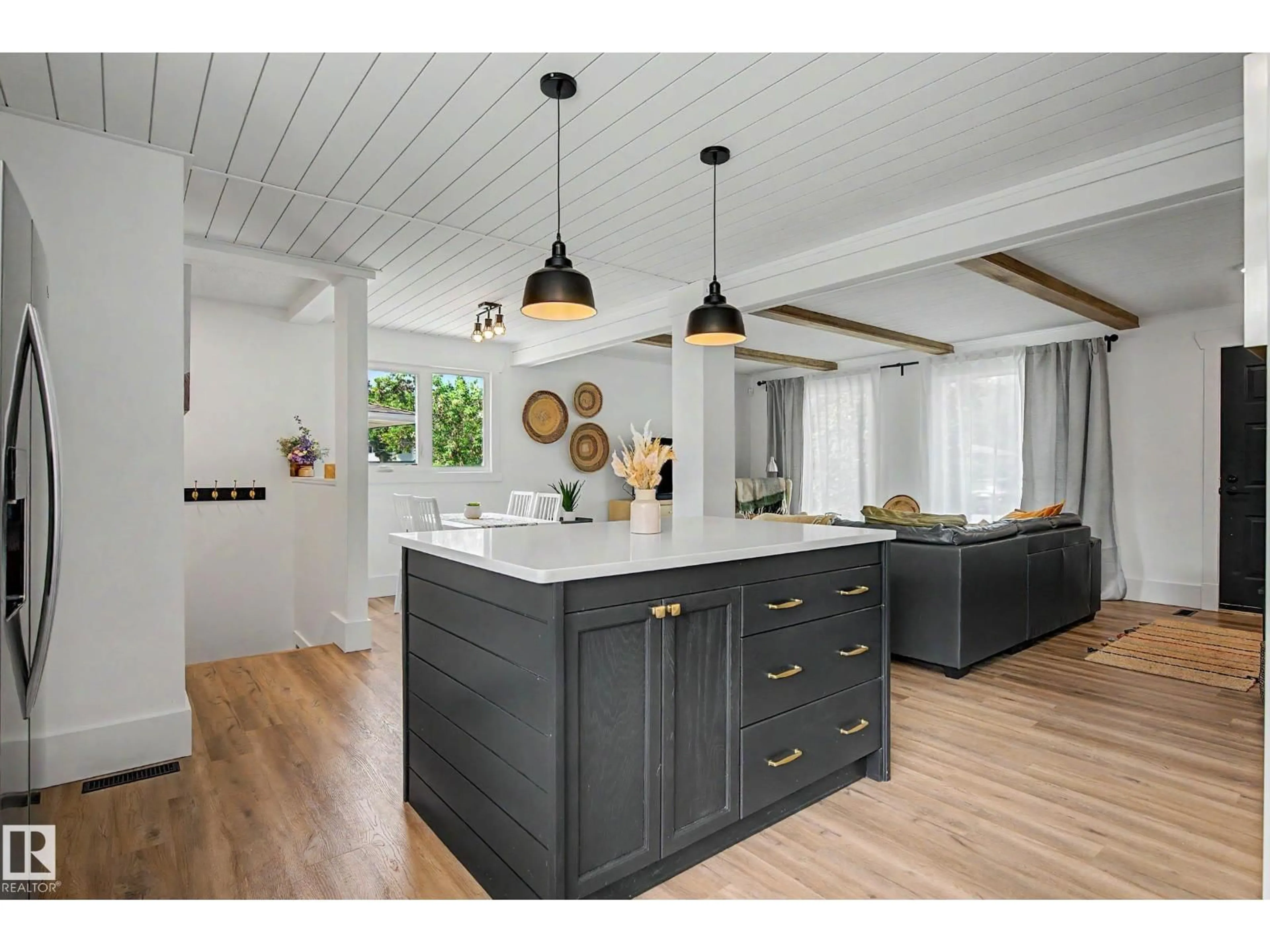 Open concept kitchen, wood/laminate floor for 4305 43A AV, Leduc Alberta T9E4T4