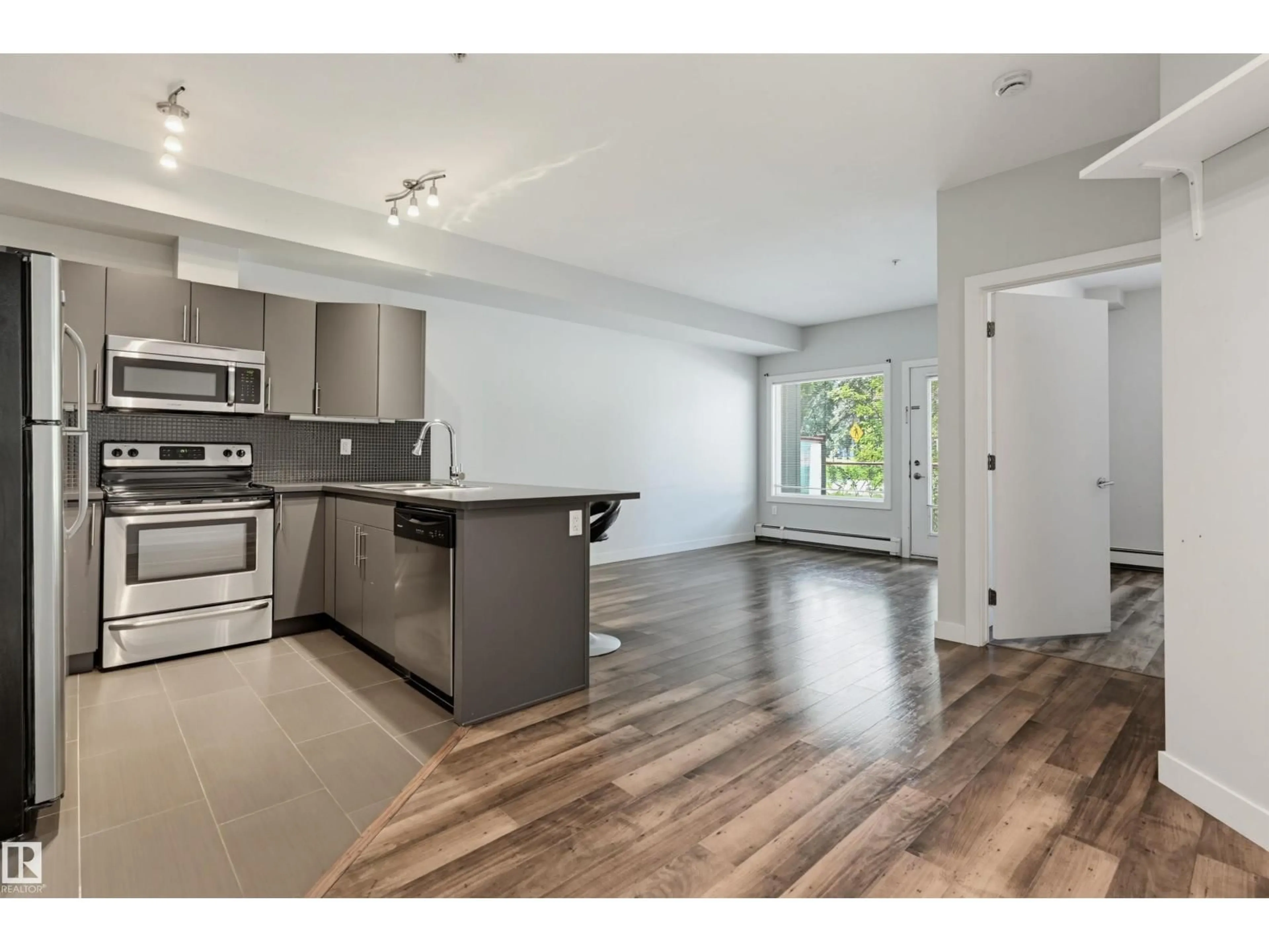 Open concept kitchen, unknown for #103 - 10611 117 ST, Edmonton Alberta T5H0G6