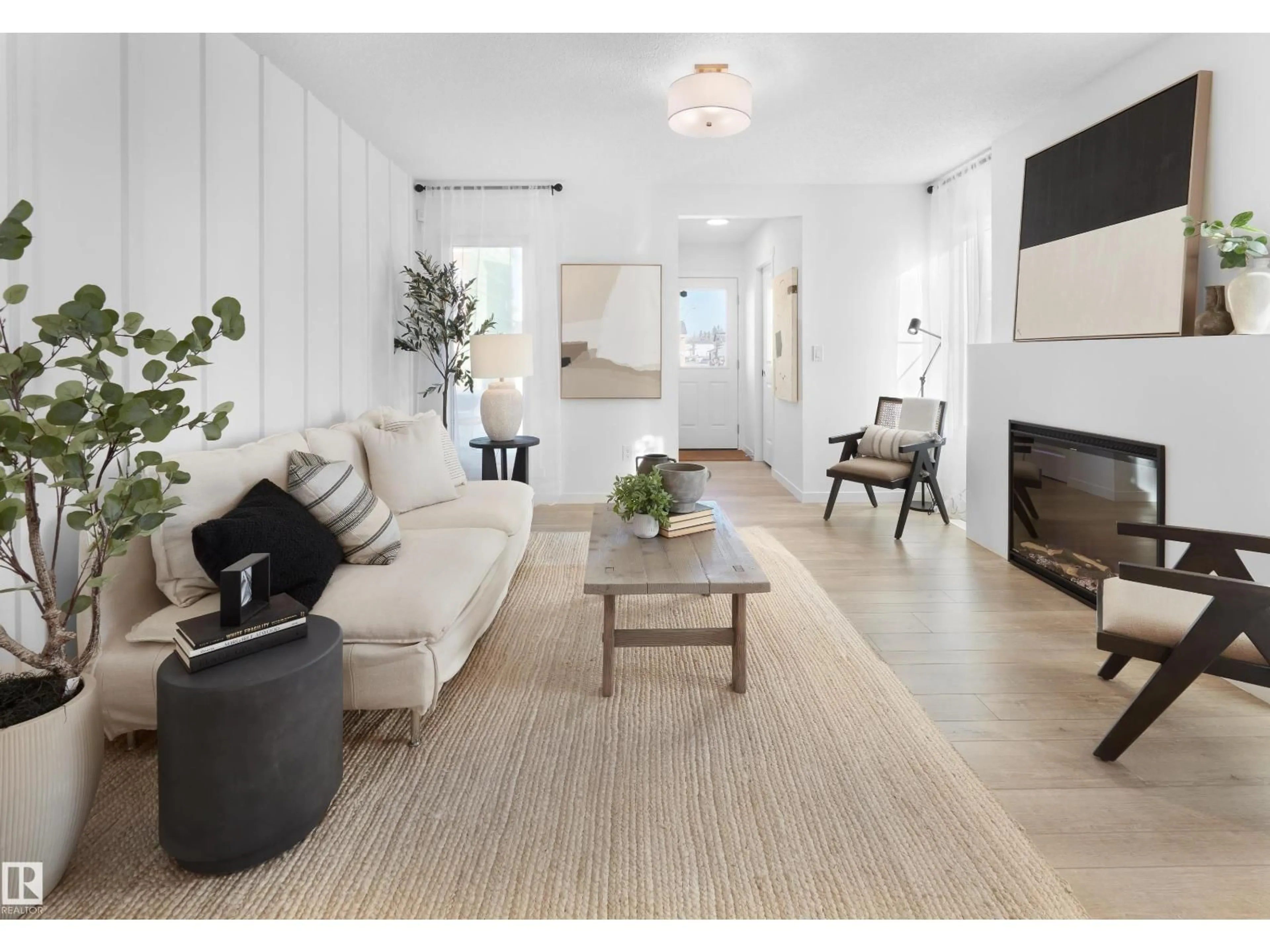 Living room with furniture, unknown for NW - 18628 18 AV, Edmonton Alberta T6M3E8