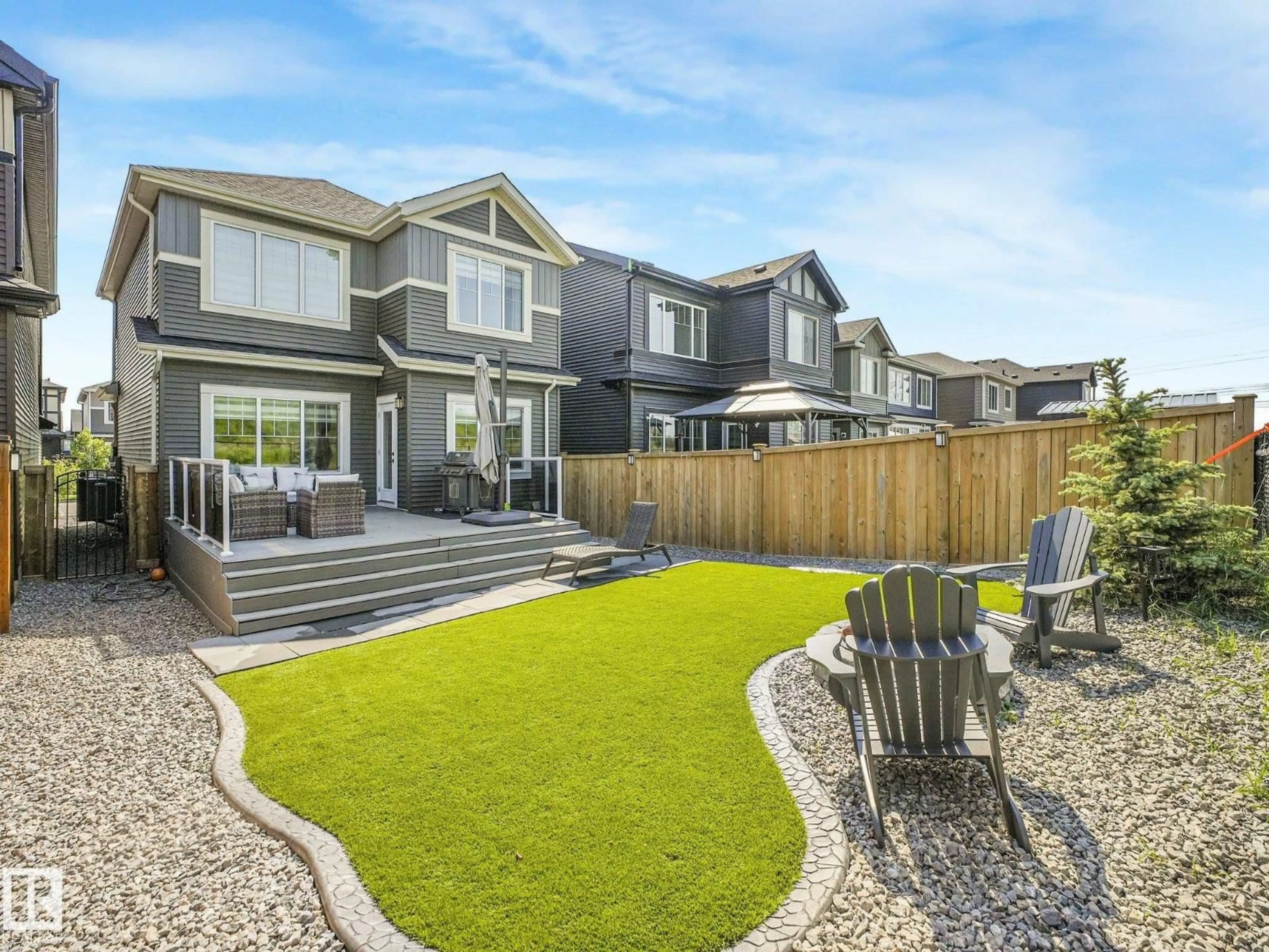 Home with vinyl exterior material, street for 1214 EATON LN, Edmonton Alberta T6M1M9