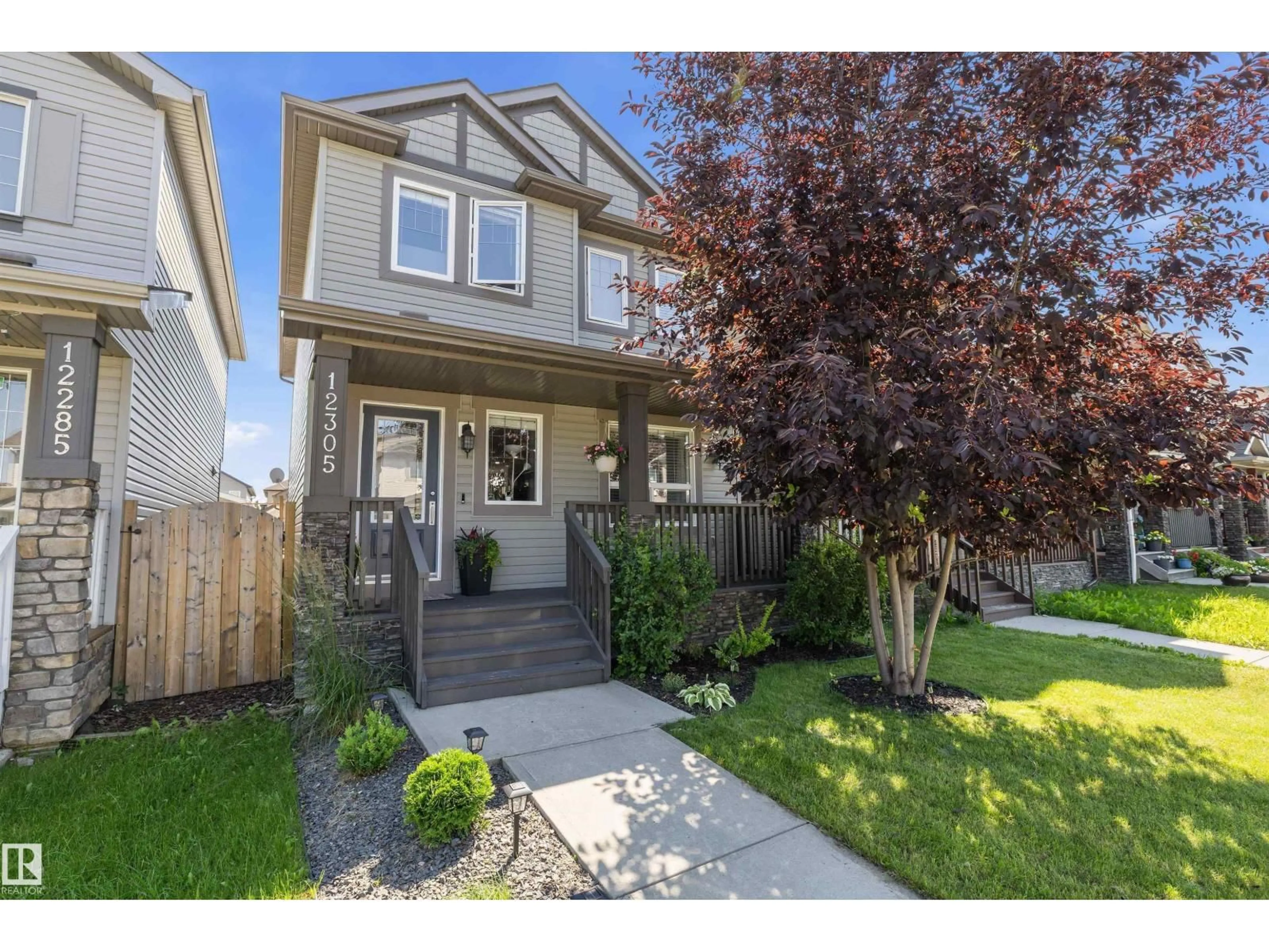 Home with vinyl exterior material, street for 12305 173A AV, Edmonton Alberta T5X0J8