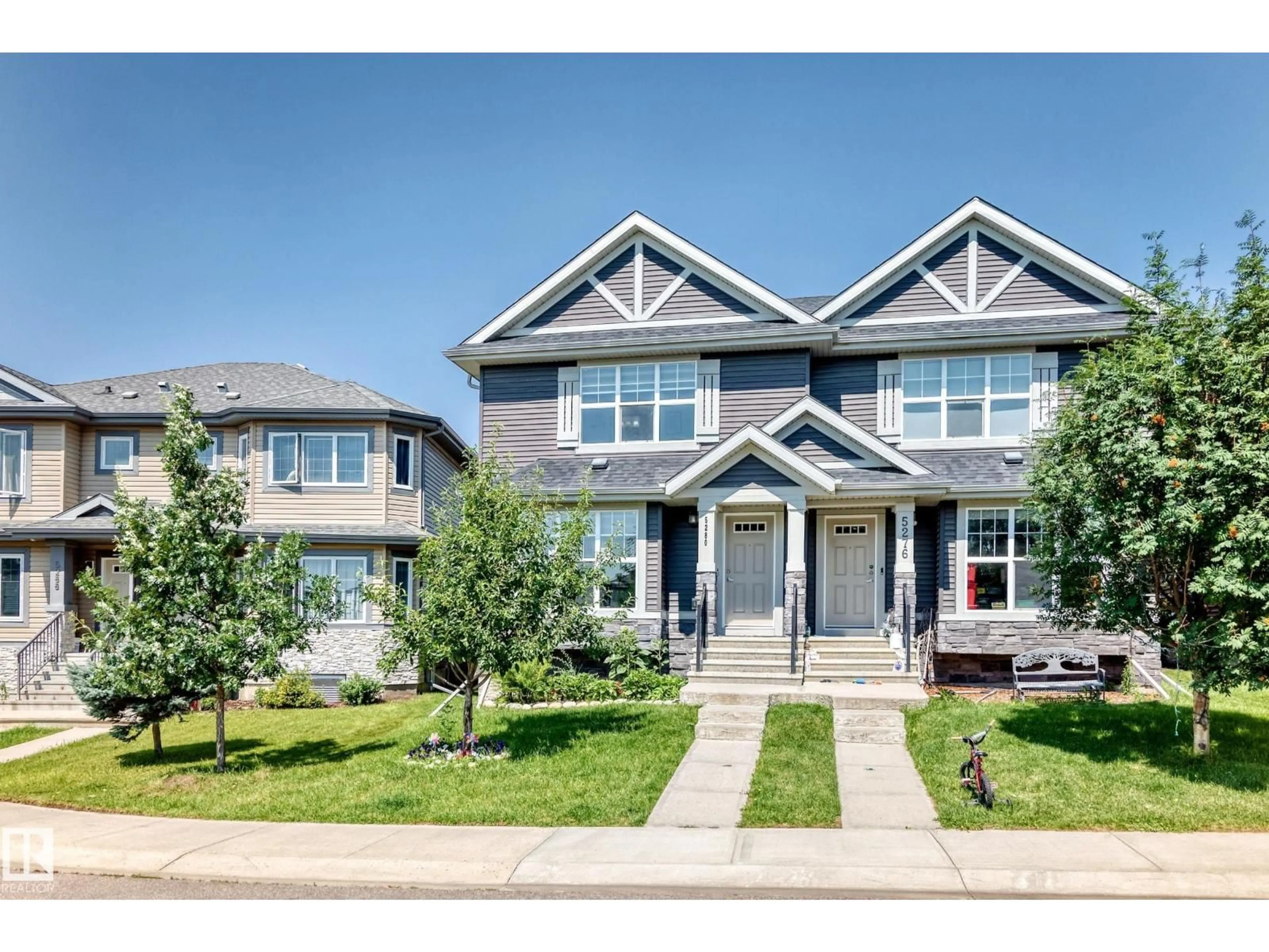Home with vinyl exterior material, street for SW - 5280 21 AV, Edmonton Alberta T6X1X3