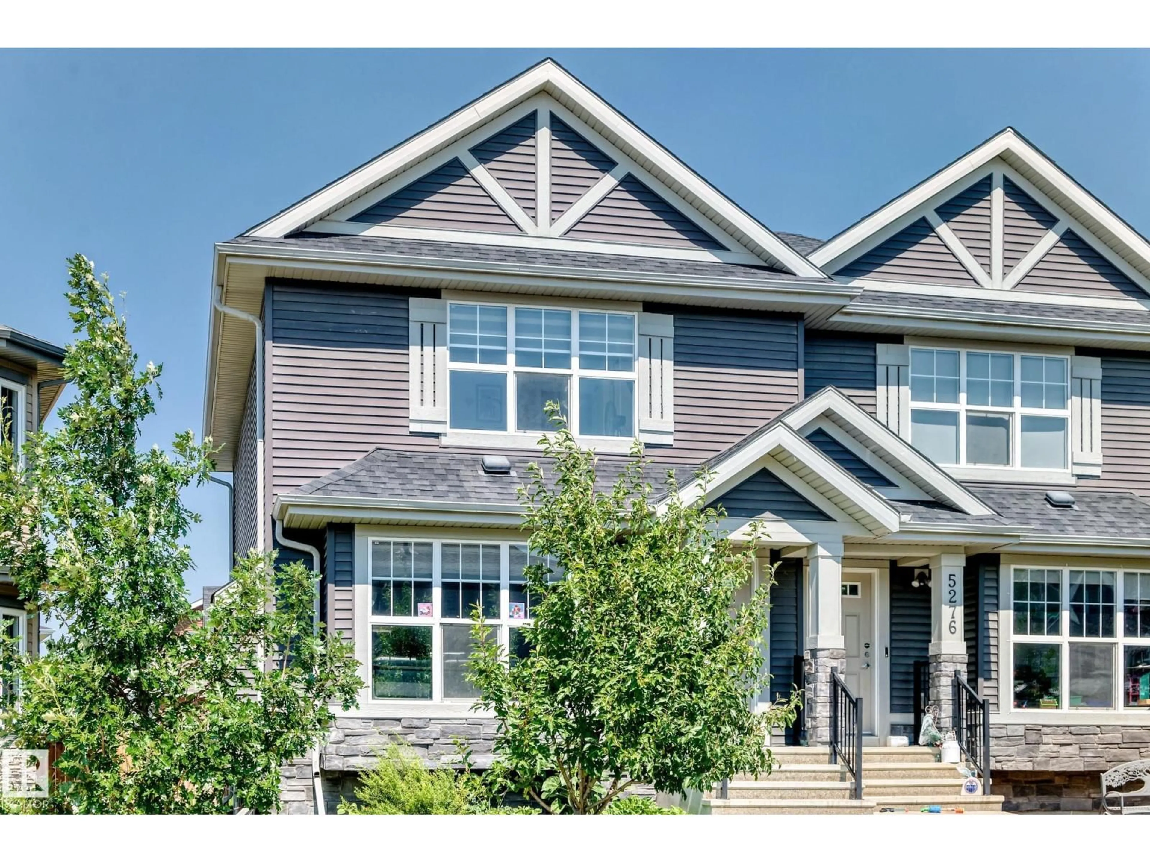 Home with vinyl exterior material, street for SW - 5280 21 AV, Edmonton Alberta T6X1X3