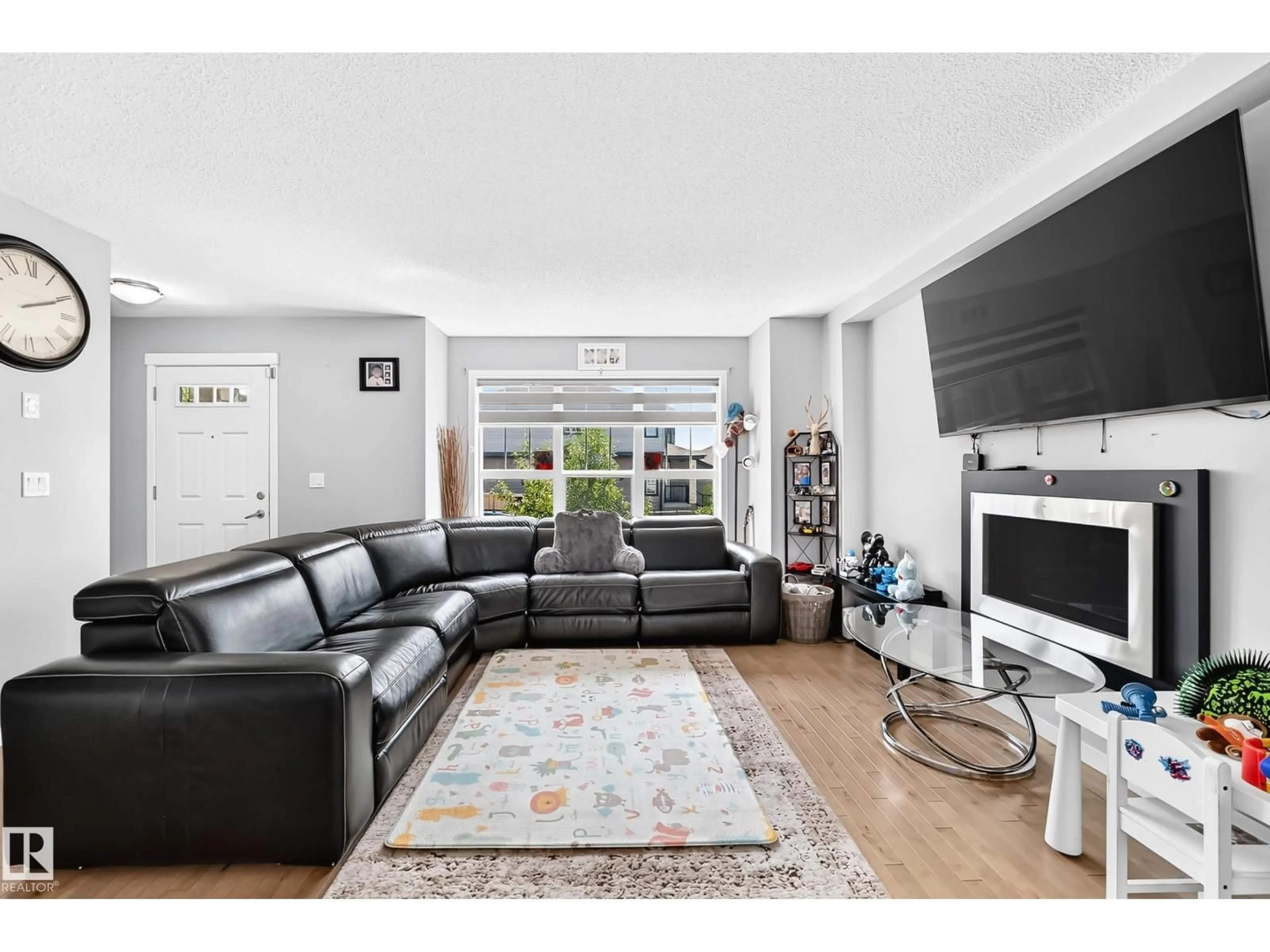 Living room with furniture, unknown for SW - 5280 21 AV, Edmonton Alberta T6X1X3
