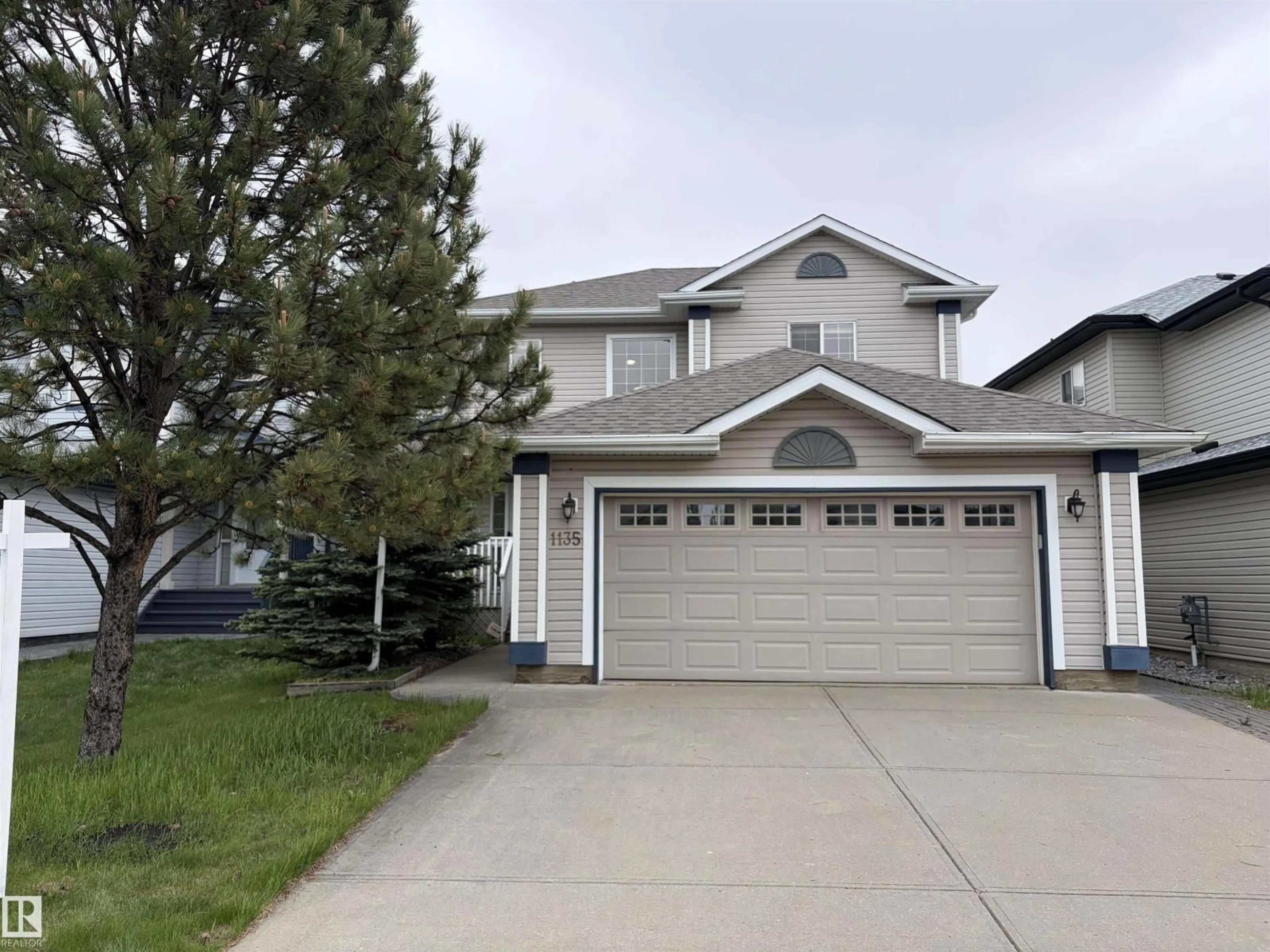 Home with vinyl exterior material, street for SW - 1135 112 ST, Edmonton Alberta T6W1V1